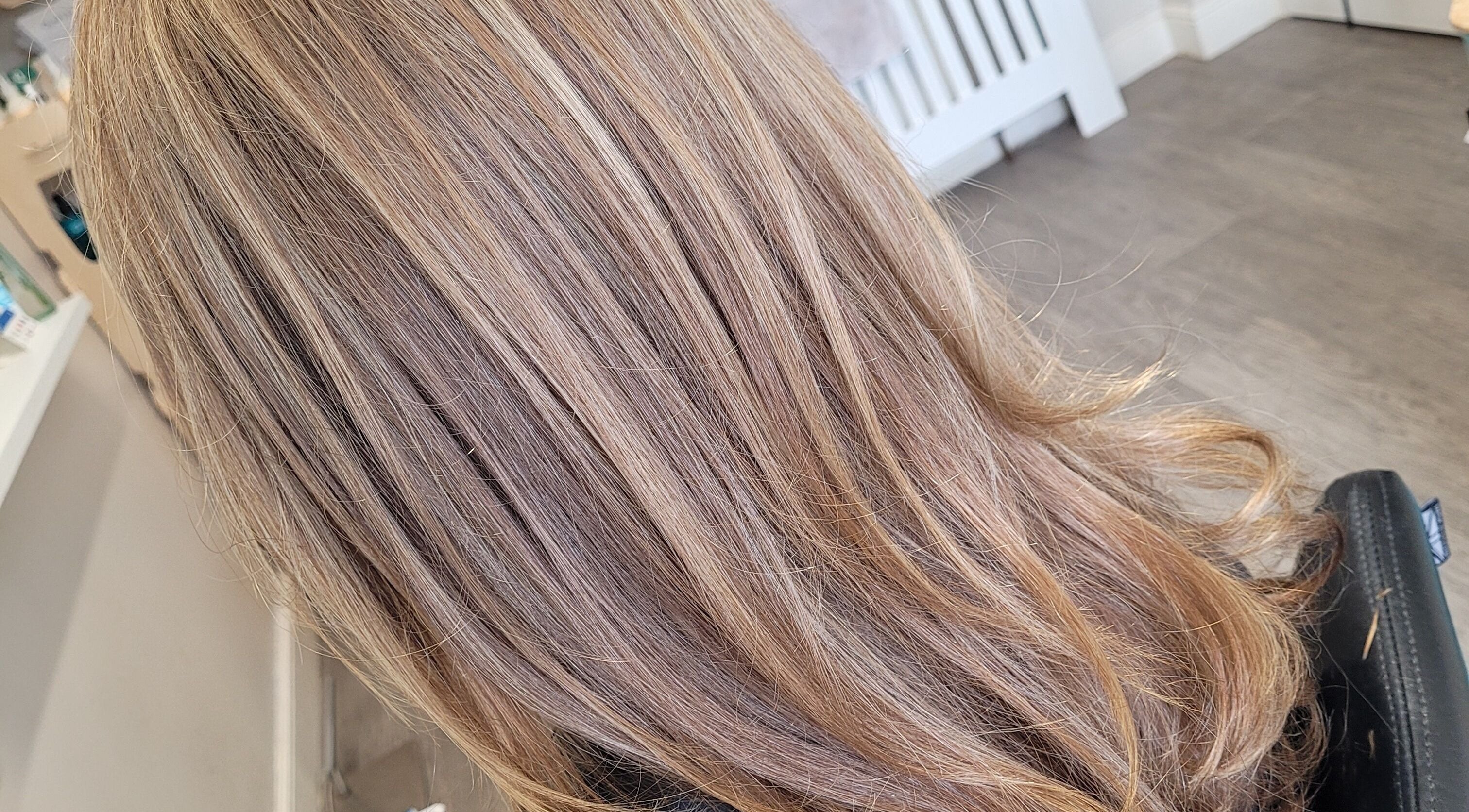 Elegant blonde highlights at Bellissimo Hair, Liversedge roberttown, England, GB.