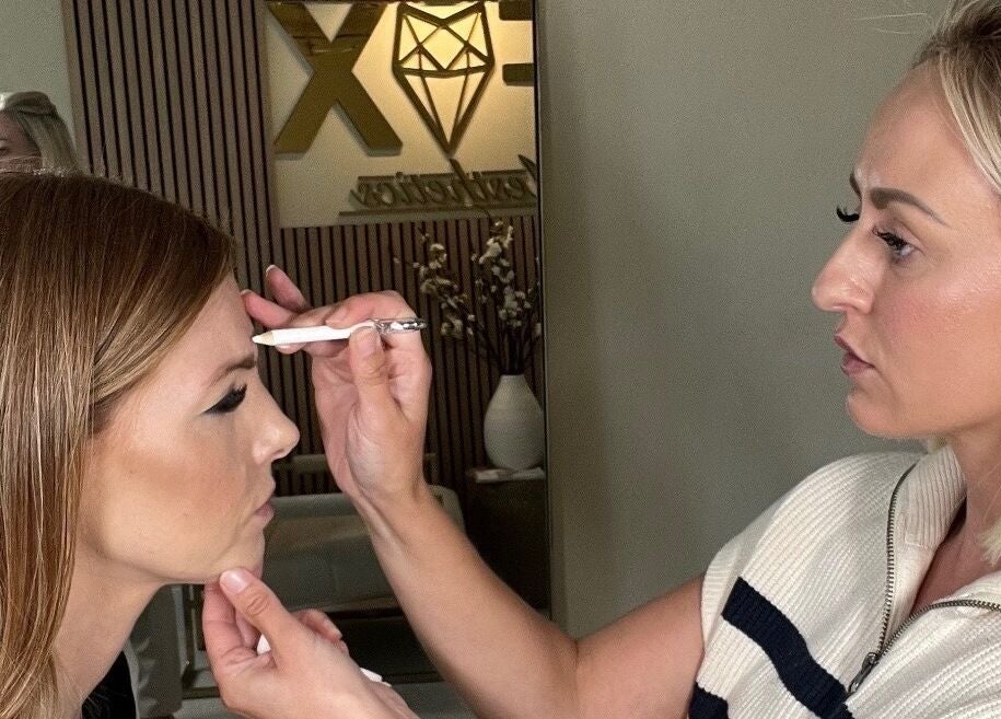 Expert brow shaping at Fox Aesthetics, Bridgend, Wales, GB - enhancing beauty through precision.