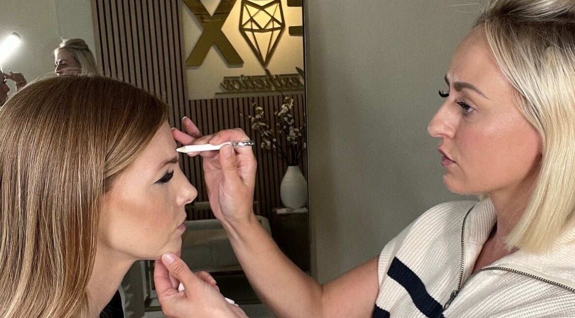 Expert brow shaping at Fox Aesthetics, Bridgend, Wales, GB - enhancing beauty through precision.