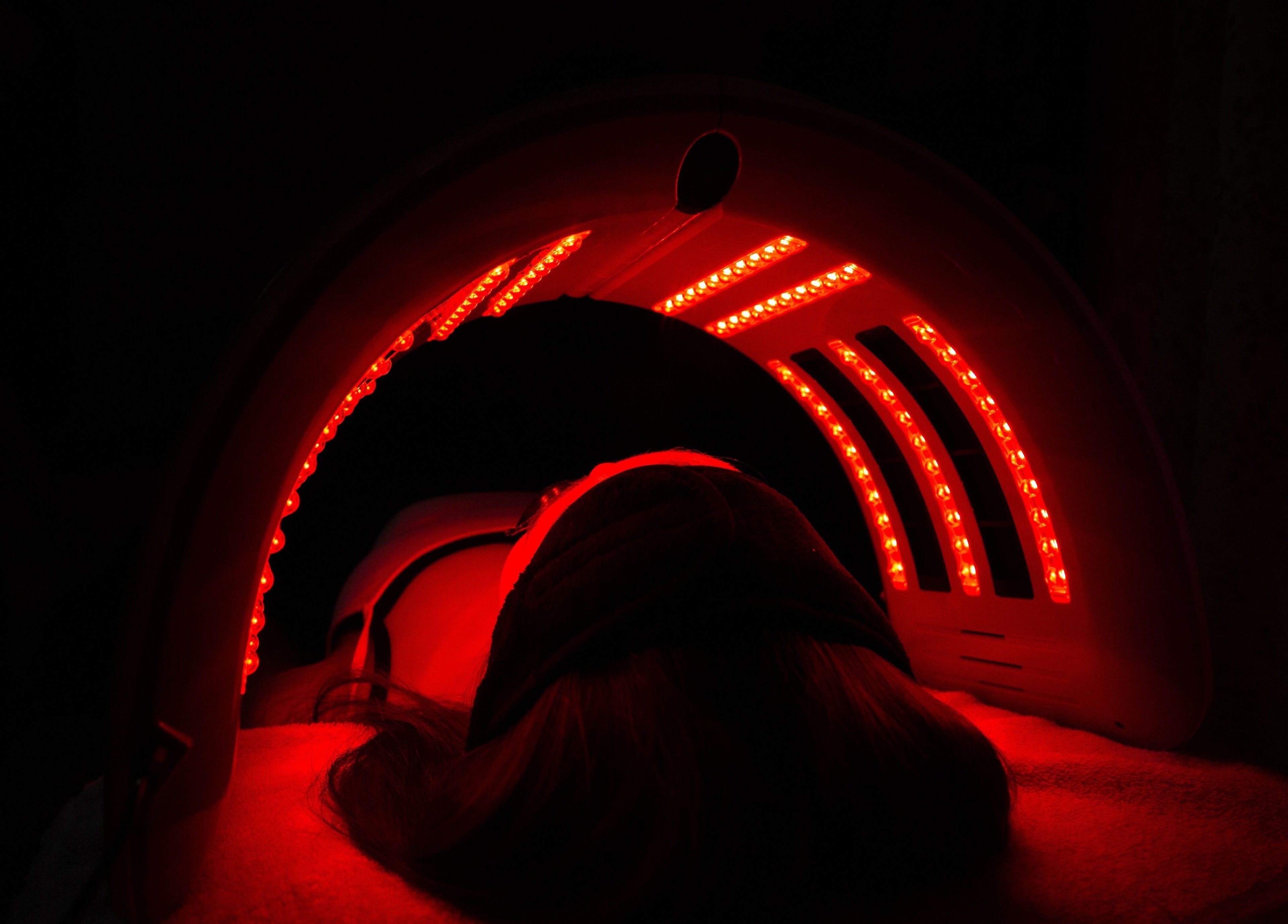 Red light therapy session at Glow Studio, Sandton, Gauteng, ZA enhances skin rejuvenation and relaxation.