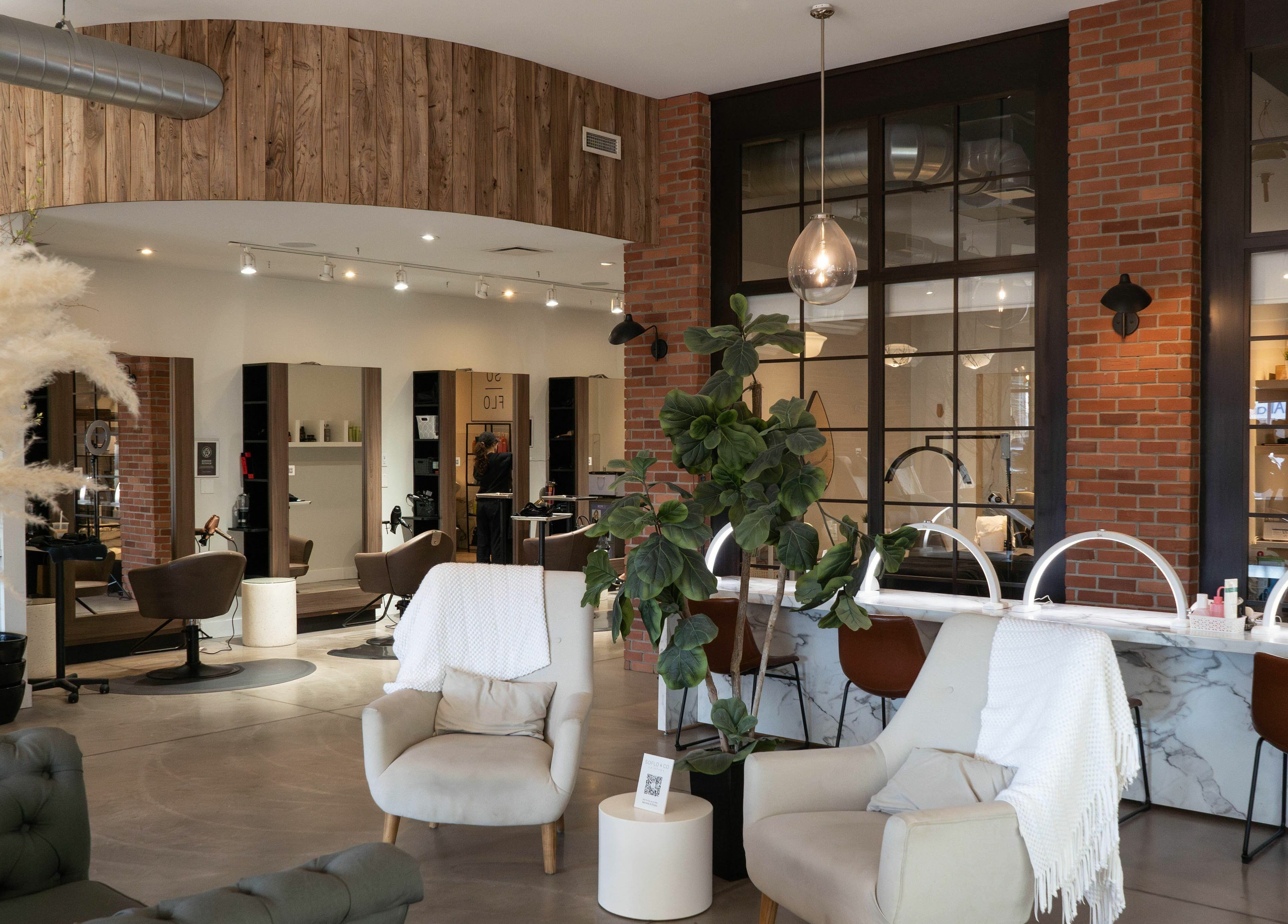 Elegant interior of SoFlo & Co North in Moncton, New Brunswick, CA showcasing a cozy seating area.