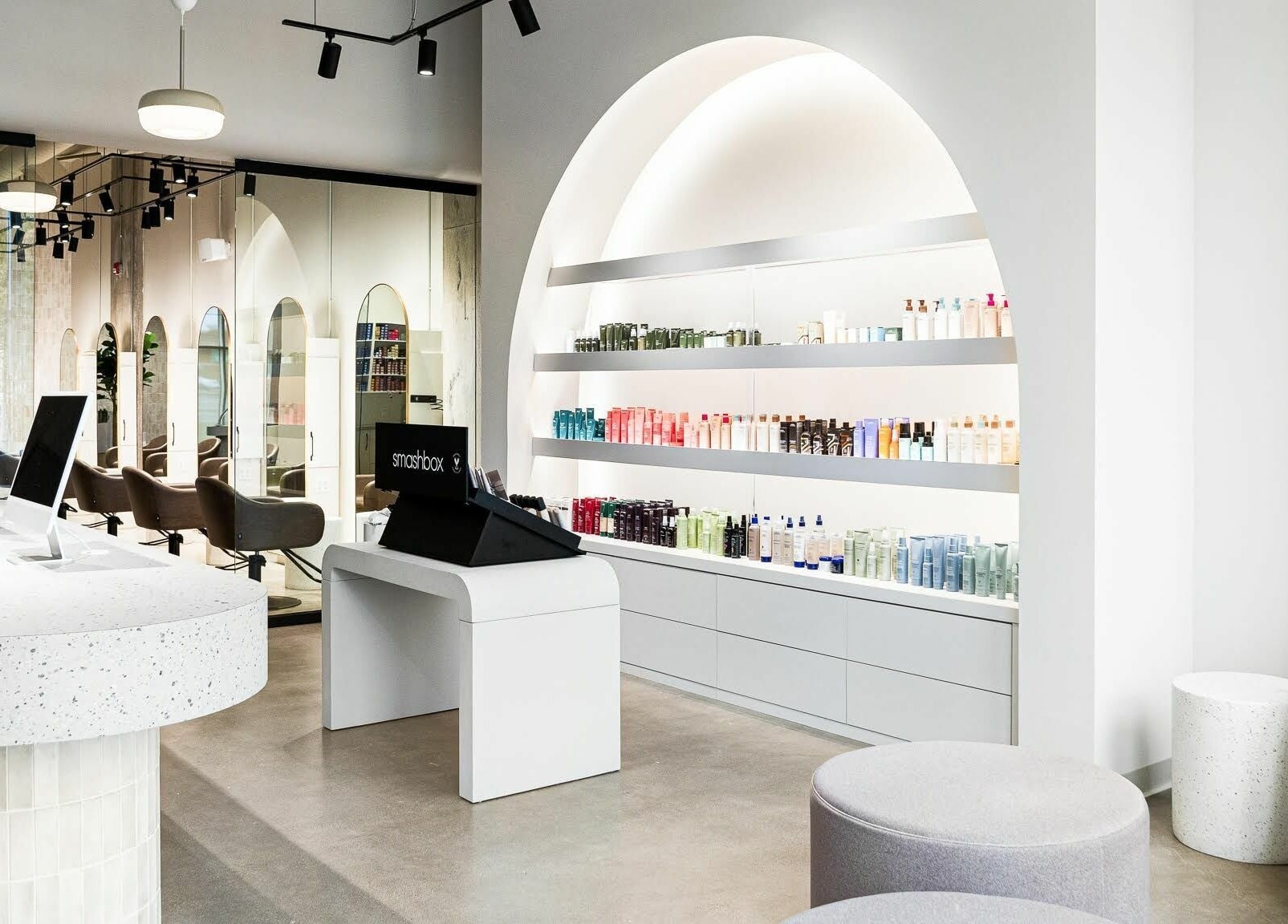 Chic interior of SoFlo & Co Tannery, Moncton, New Brunswick, CA showcasing products and sleek seating.