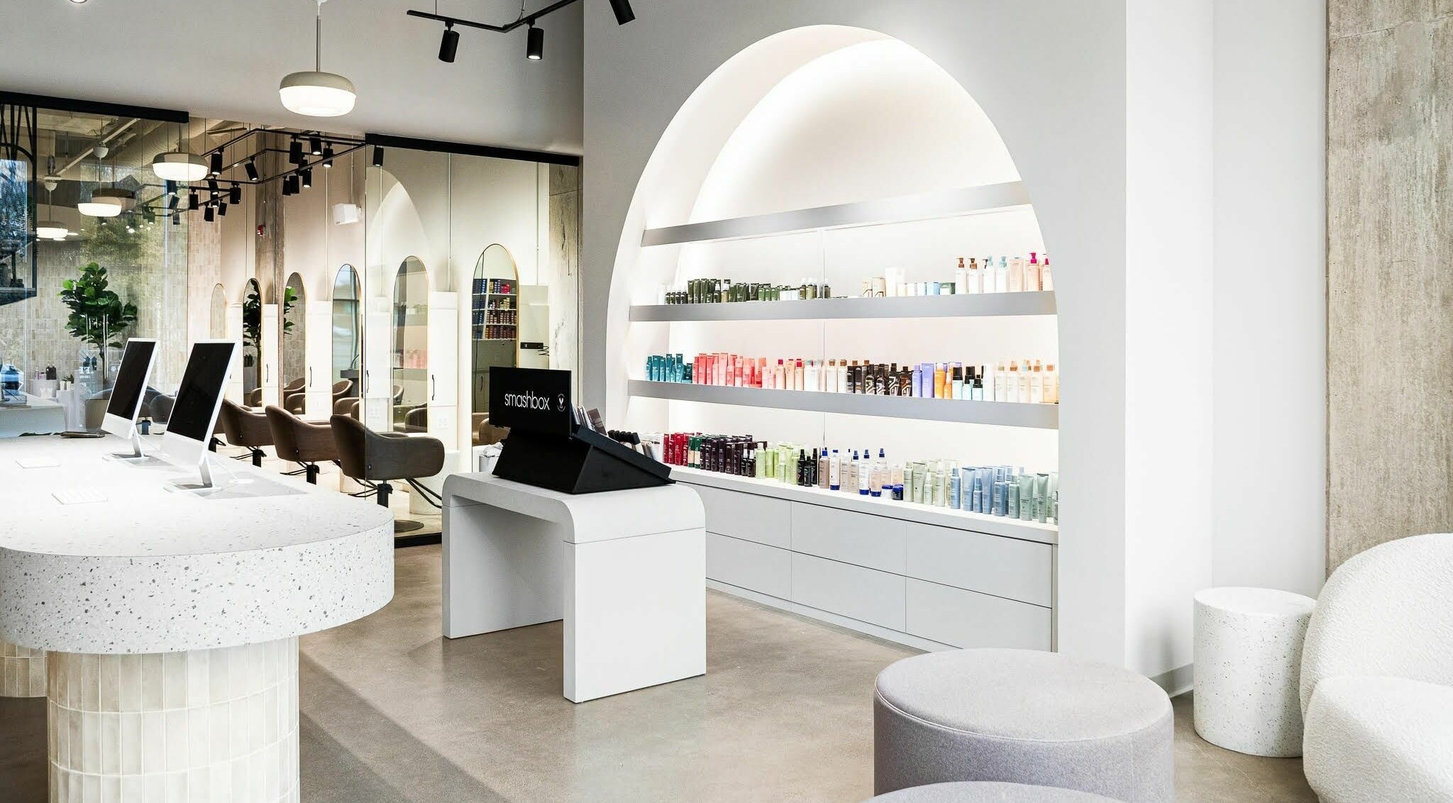 Chic interior of SoFlo & Co Tannery, Moncton, New Brunswick, CA showcasing products and sleek seating.