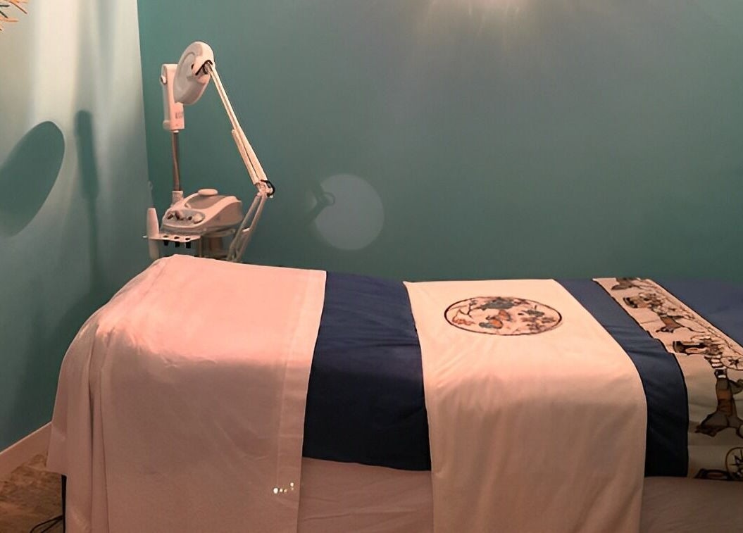 Relaxing massage room at Acqua spa in Orlando, Florida, US with serene decor and soft lighting.