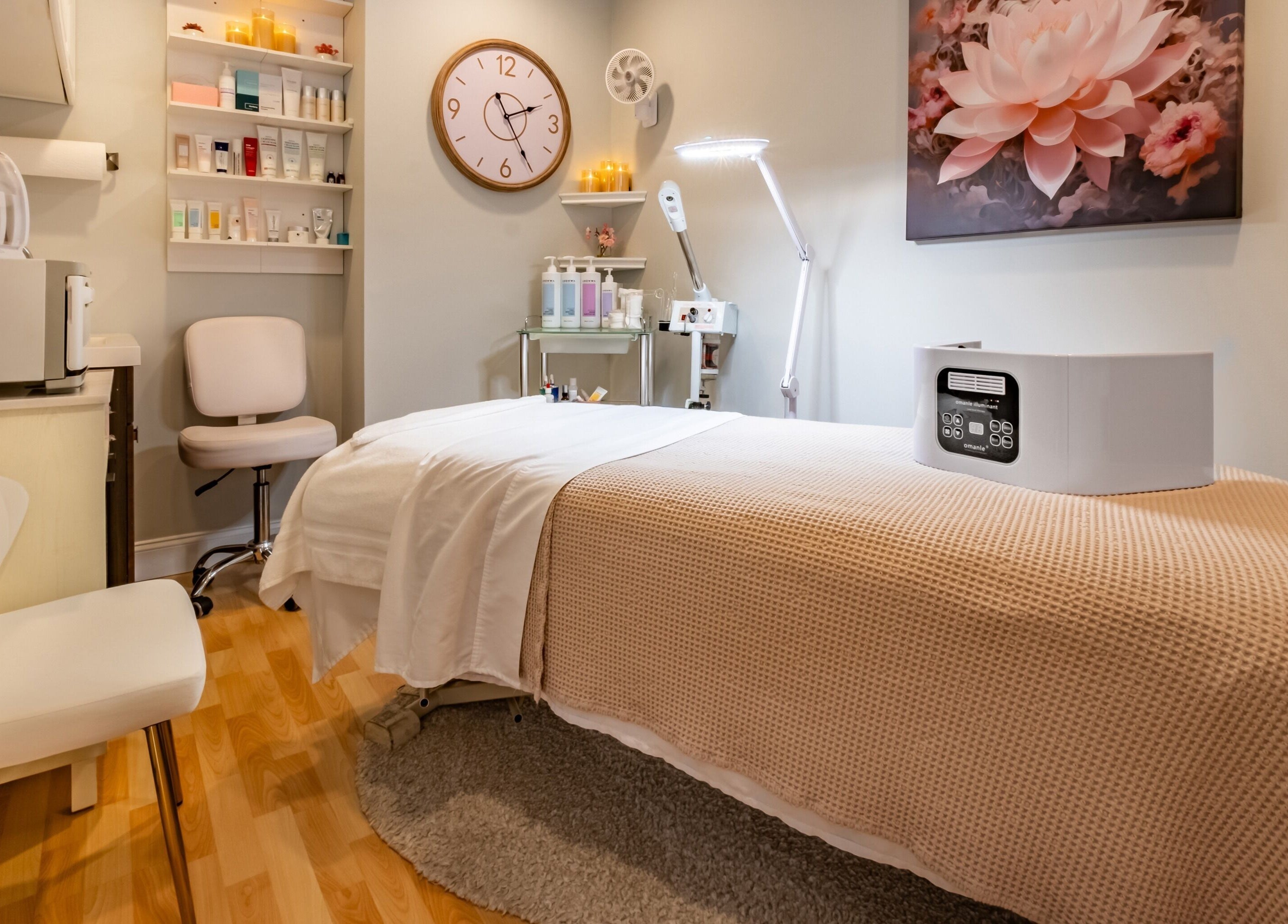 Tranquil Pink Glow Facial Room with serene decor and cozy bed in Manasquan, New Jersey, US.