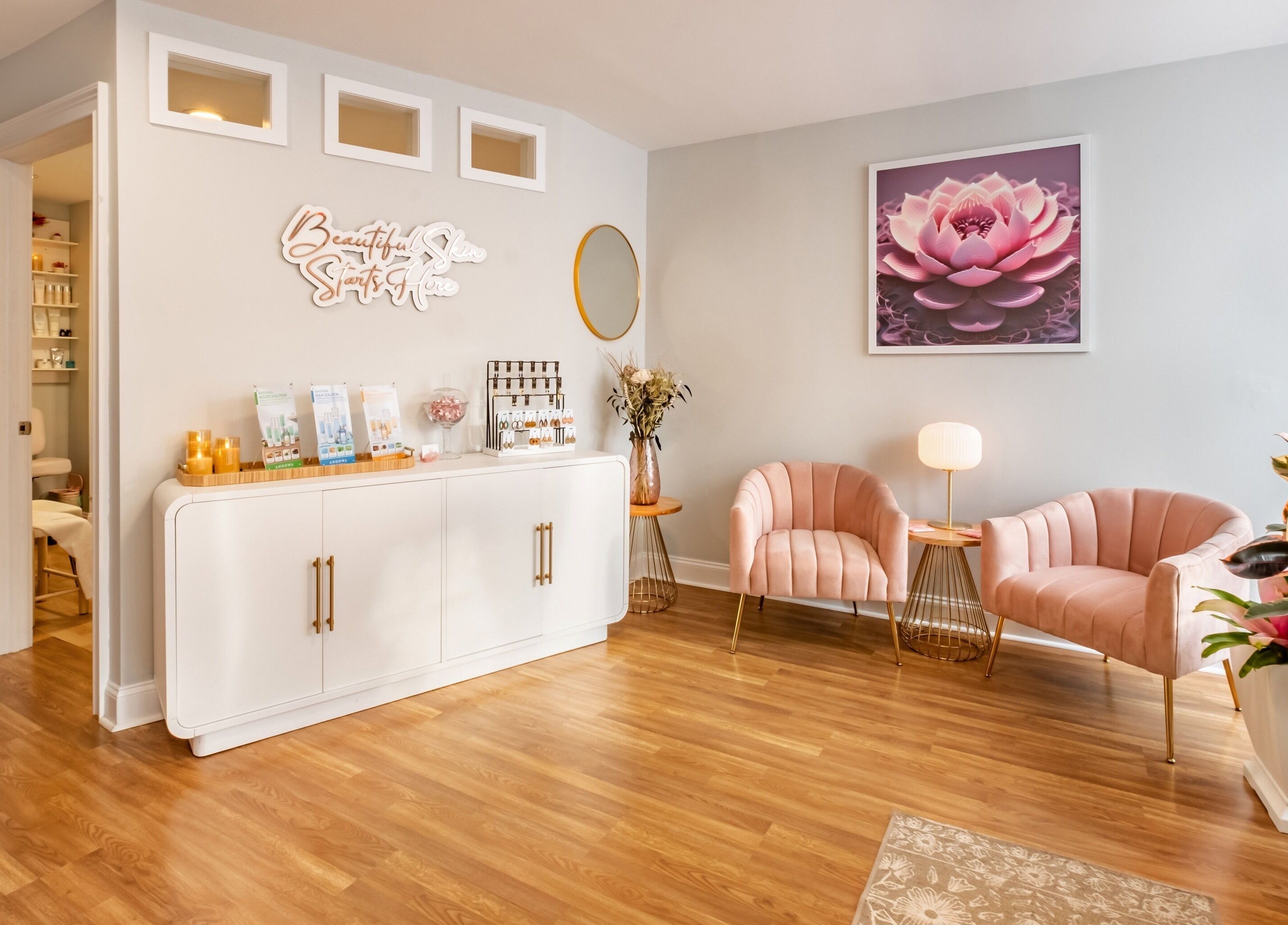 Elegant waiting area at Pink Glow Facial Room, Manasquan, New Jersey, US. Features plush chairs and soothing decor.
