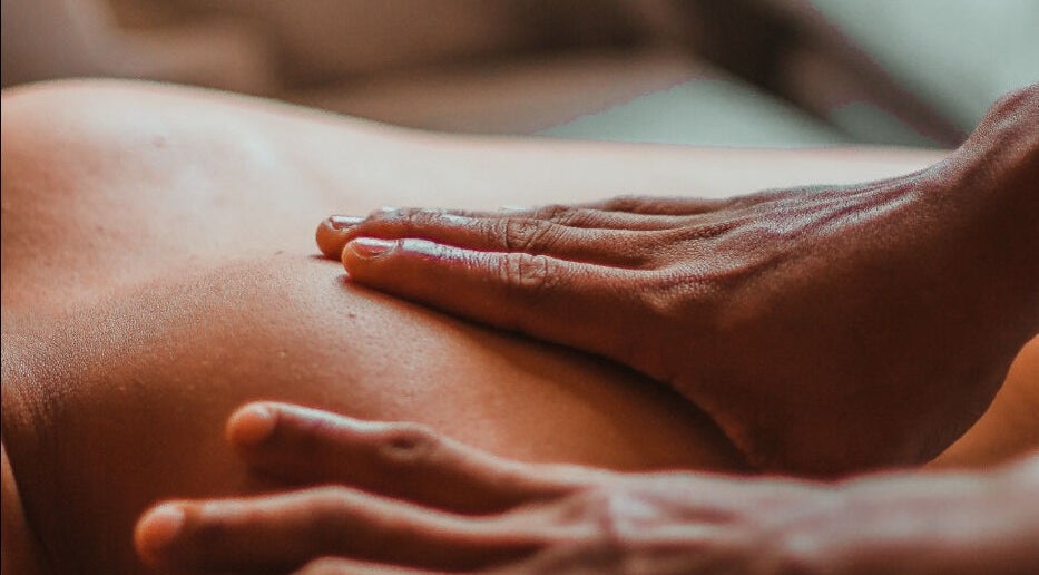 Relaxing massage at Revive Holistic Therapies, Hednesford, England, GB. Soothing touch therapy session.