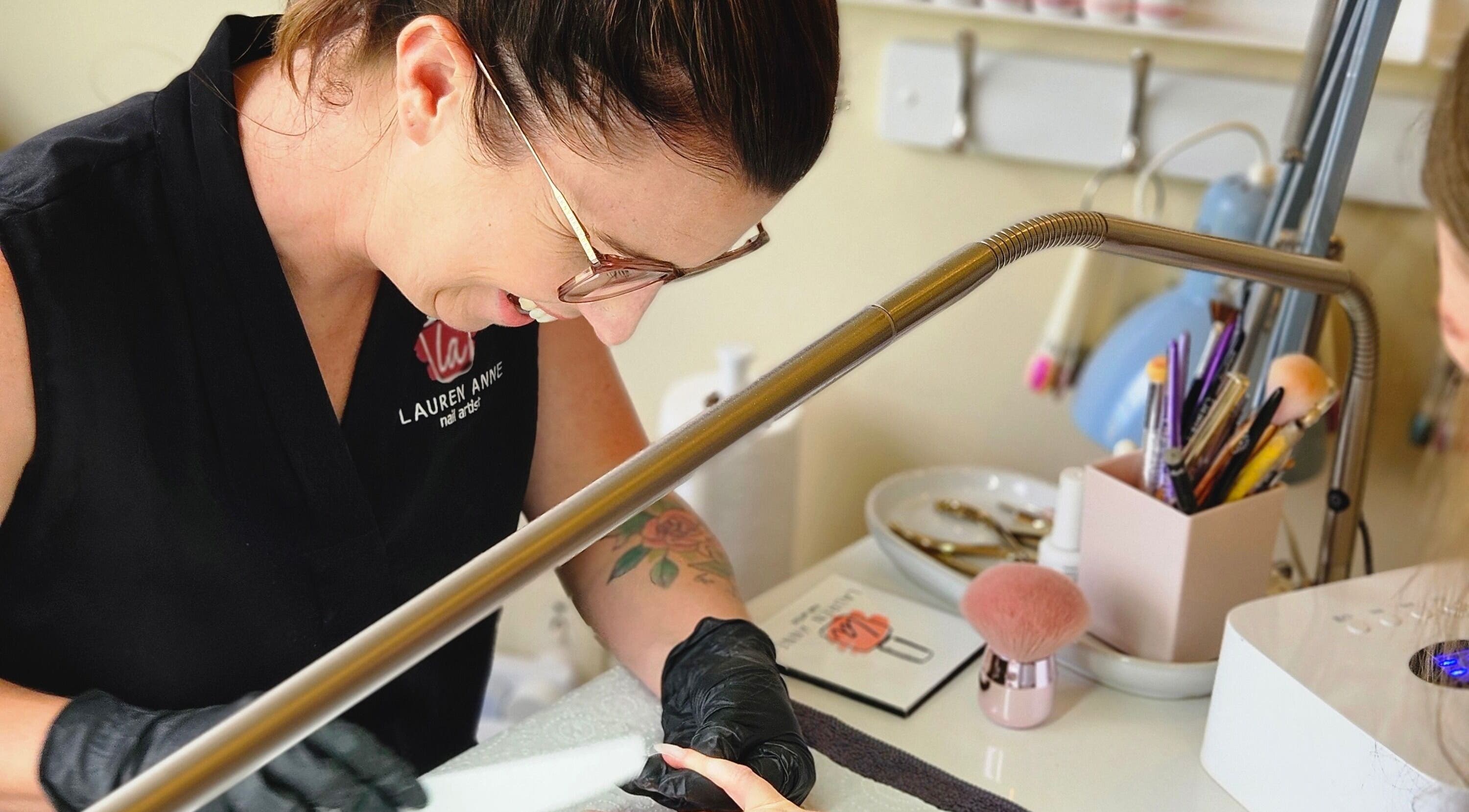 Nail artist at Lauren Anne Nails, Auckland, crafting beautiful nail designs with precision.