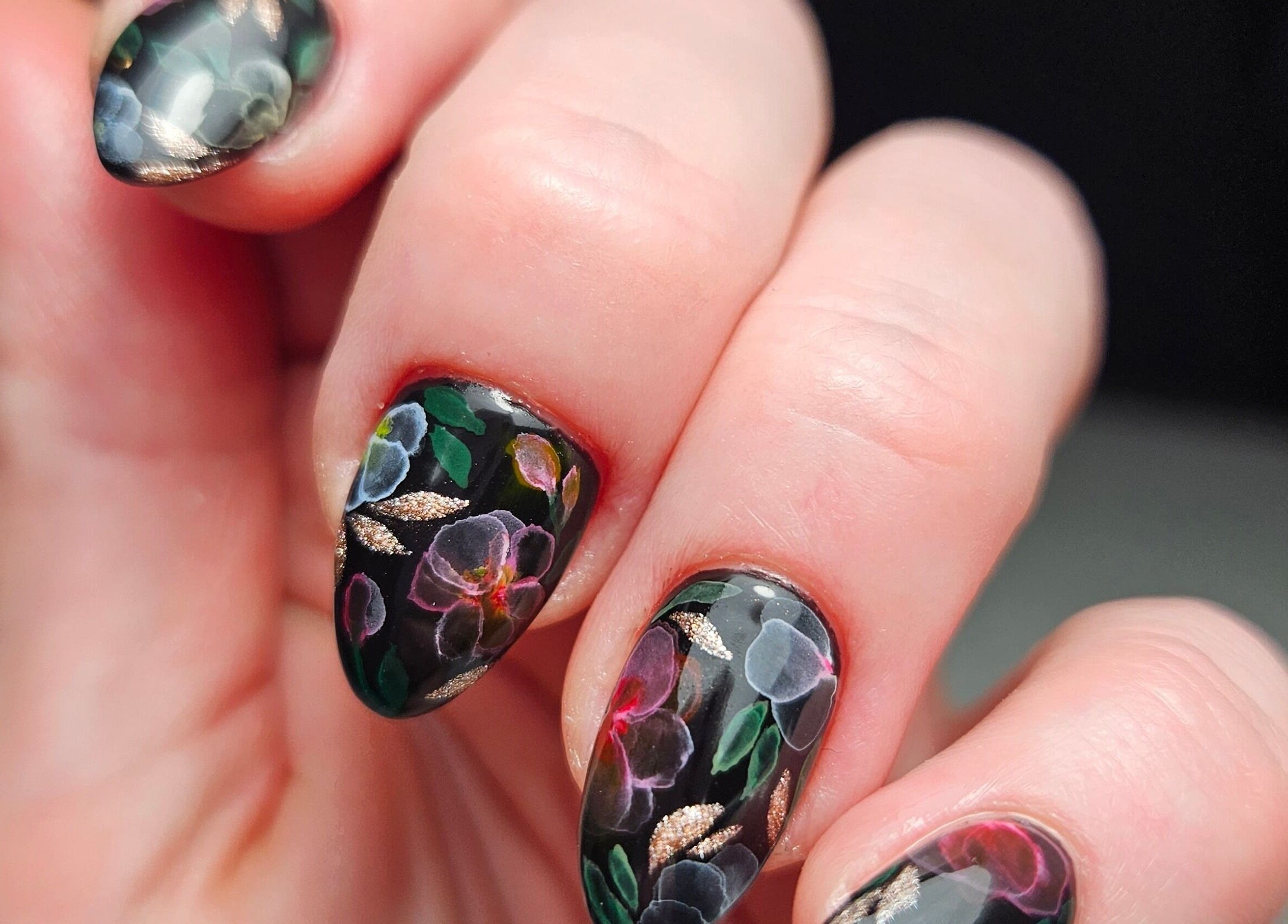 Artistic floral nail design from Lauren Anne Nails, Auckland, NZ, showcasing vibrant colors and precise detailing.