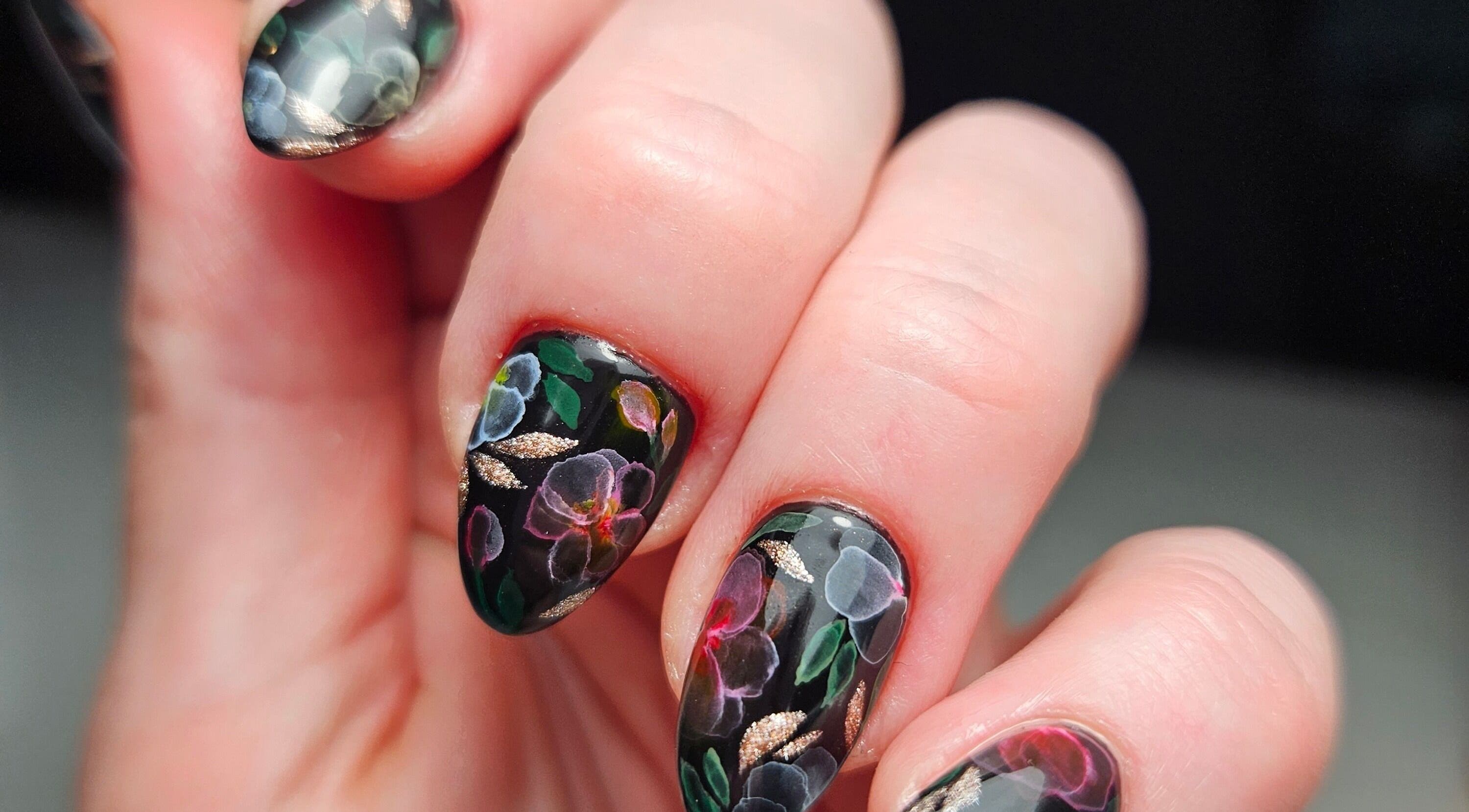 Artistic floral nail design from Lauren Anne Nails, Auckland, NZ, showcasing vibrant colors and precise detailing.