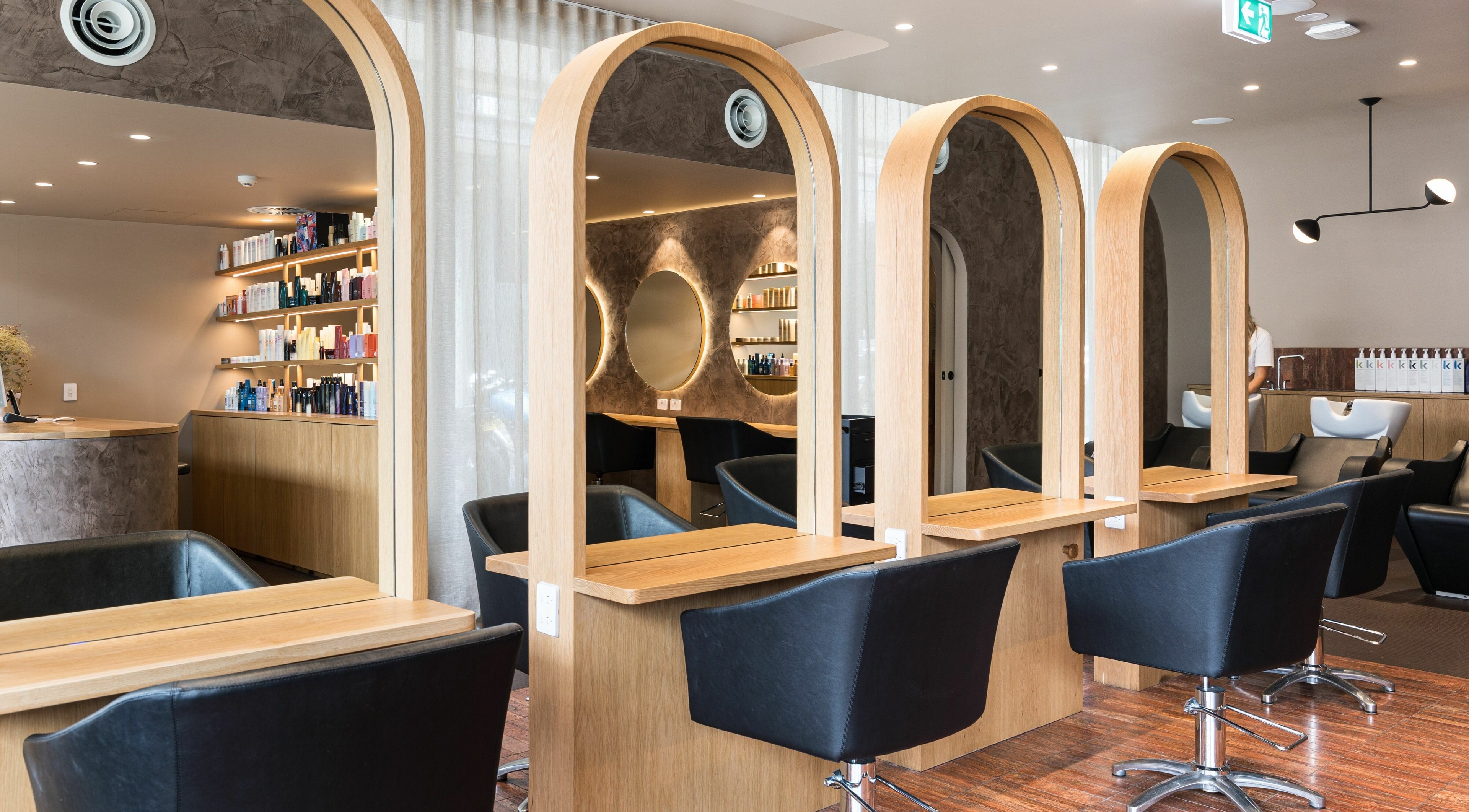 Luxurious interior of Mokosh Studio at Bondi Beach, New South Wales, AU featuring stylish salon archways.