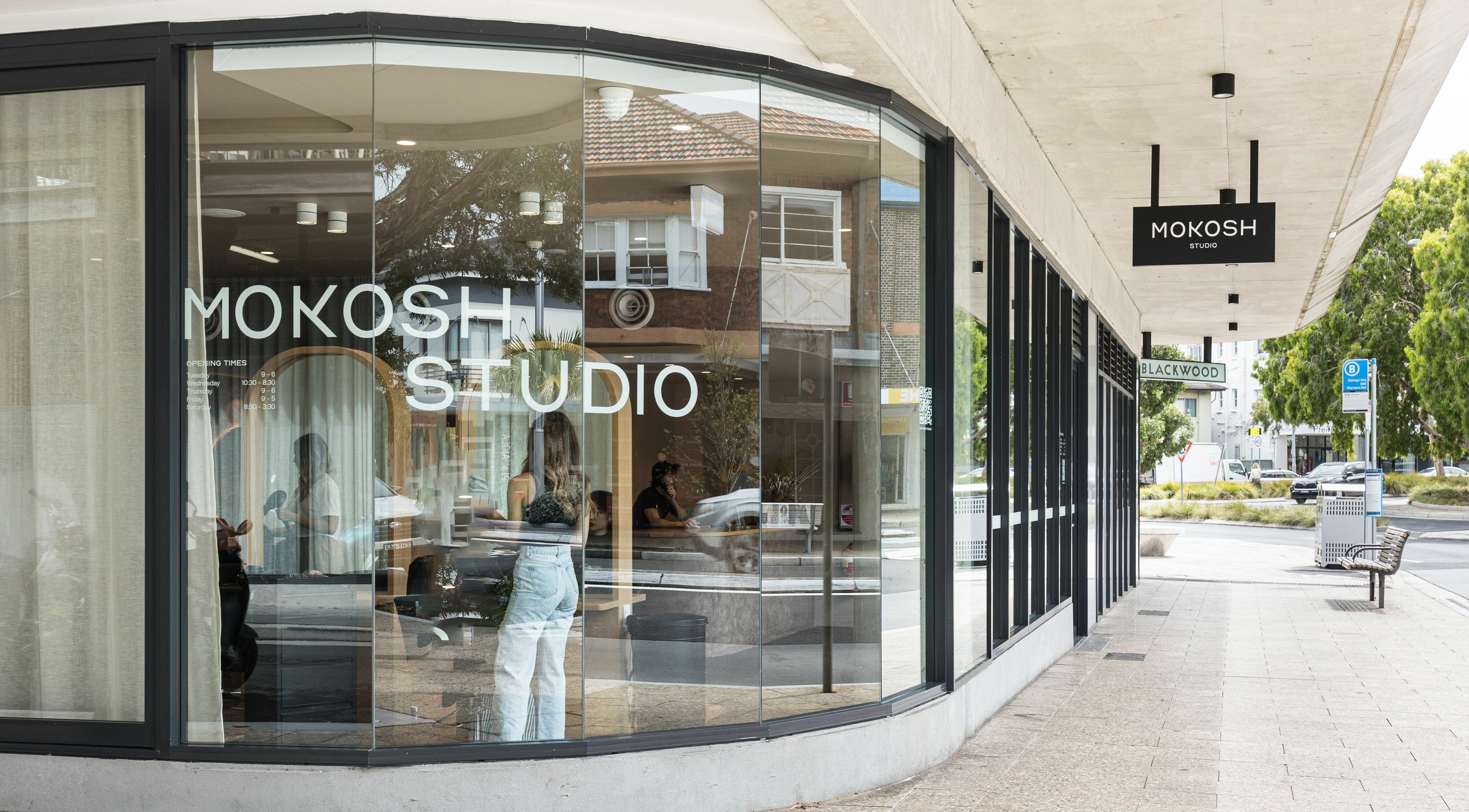 Exterior view of Mokosh Studio at Bondi Beach, New South Wales, AU showcasing modern glass design.
