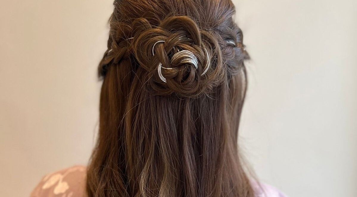 Intricate braided hairstyle at The Space Beauty Lounge, أبوظبي, Abu Dhabi, AE. Perfect for elegant occasions.