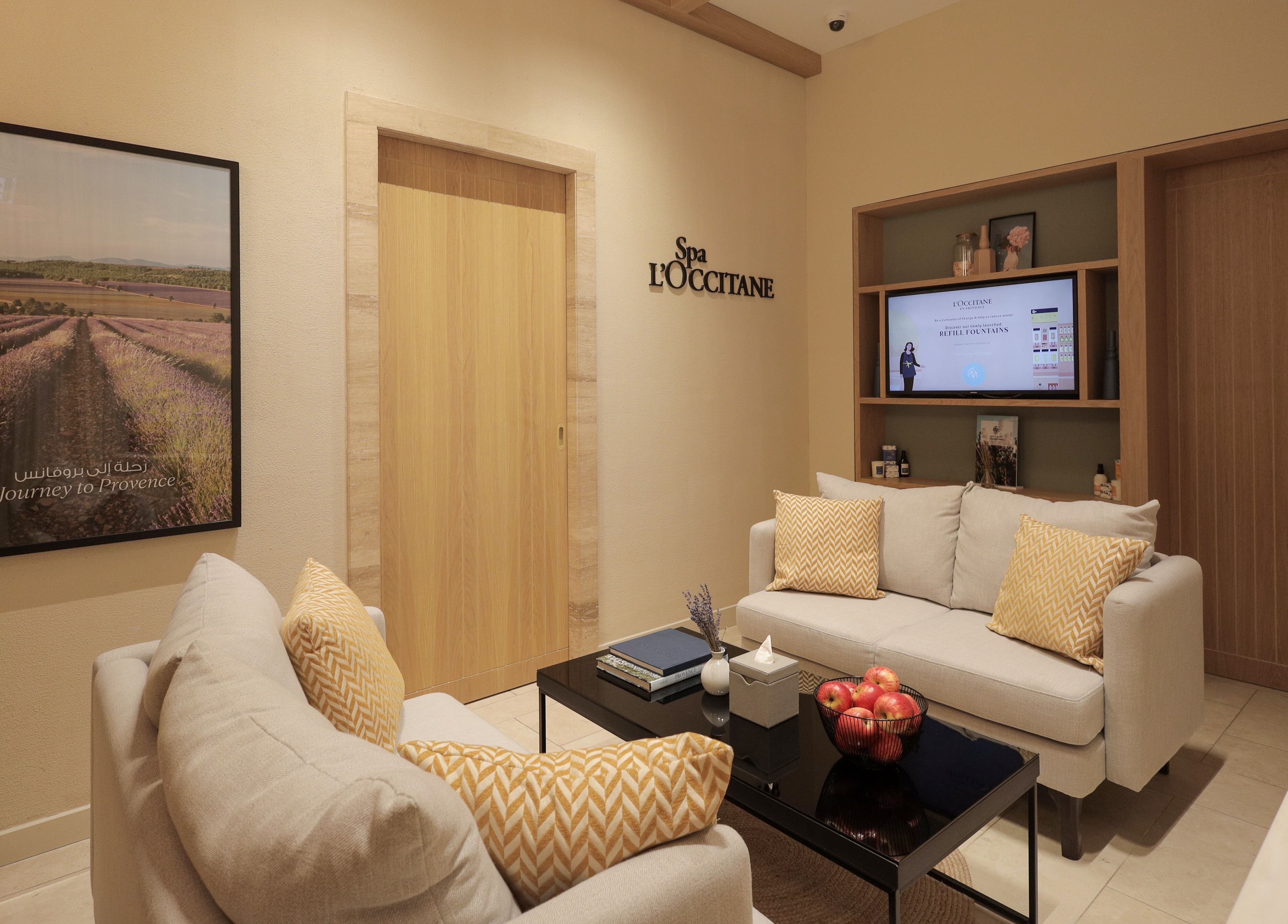 Relaxing lounge at L’Occitane Spa at Dubai Hills, دبي, دبي, AE, featuring plush seating and elegant decor.