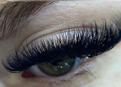 Close-up of expertly applied eyelash extensions at Jade Lashes Brows Beauty Studio in Baston, England, GB.