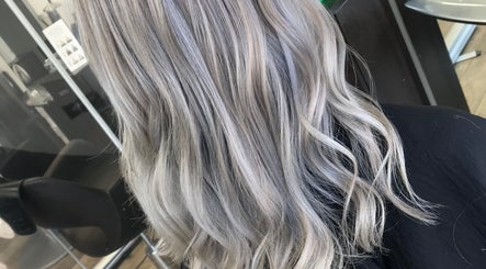 Elegant silver-blonde hair styled at Jade Gunnett Hairdressing in Blunsdon Saint Andrew, England, GB.