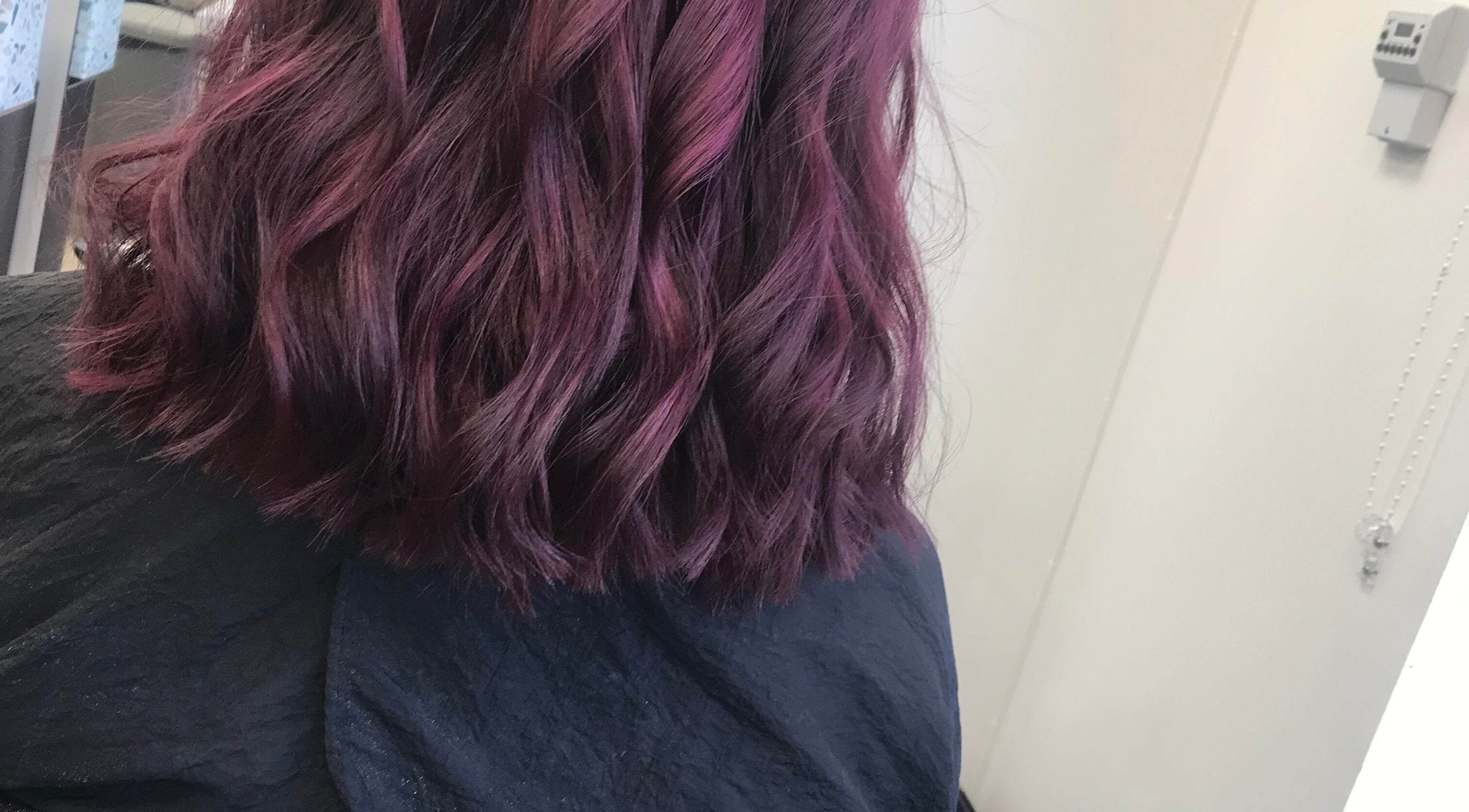 Vibrant purple hair waves styled at Jade Gunnett Hairdressing, Blunsdon Saint Andrew, England, GB.