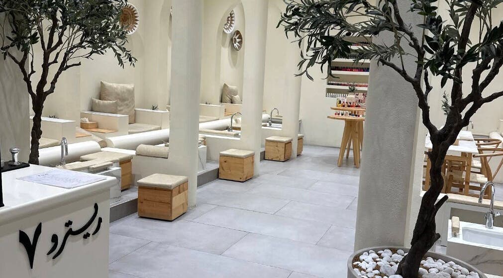 Peaceful interior of Touch Beauty Center in Sharjah, AE with elegant chairs and modern decor.