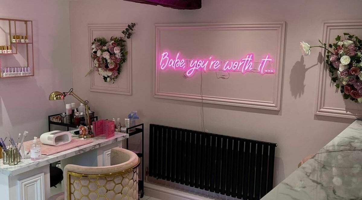 Chic interior of Fancy Academy Limited in Swinton, England, GB featuring elegant decor and beauty products.