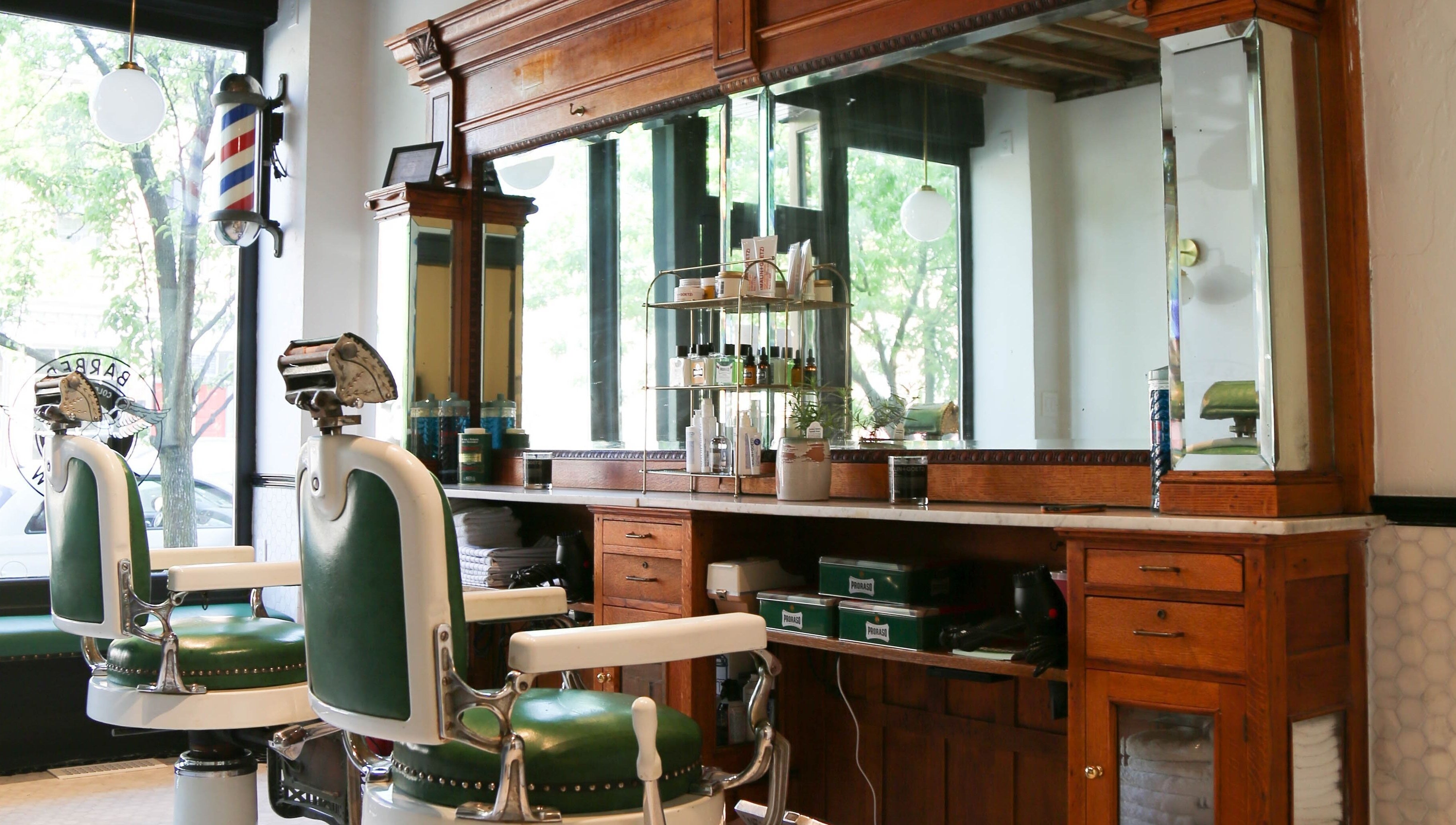Classic barber chairs and wooden counter at Bar•Ber, Cold Spring, New York, US.