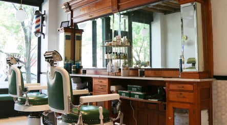 Classic barber chairs and wooden counter at Bar•Ber, Cold Spring, New York, US.