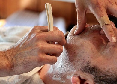 Close-up of a professional shave at Bar•Ber in Cold Spring, New York, US.