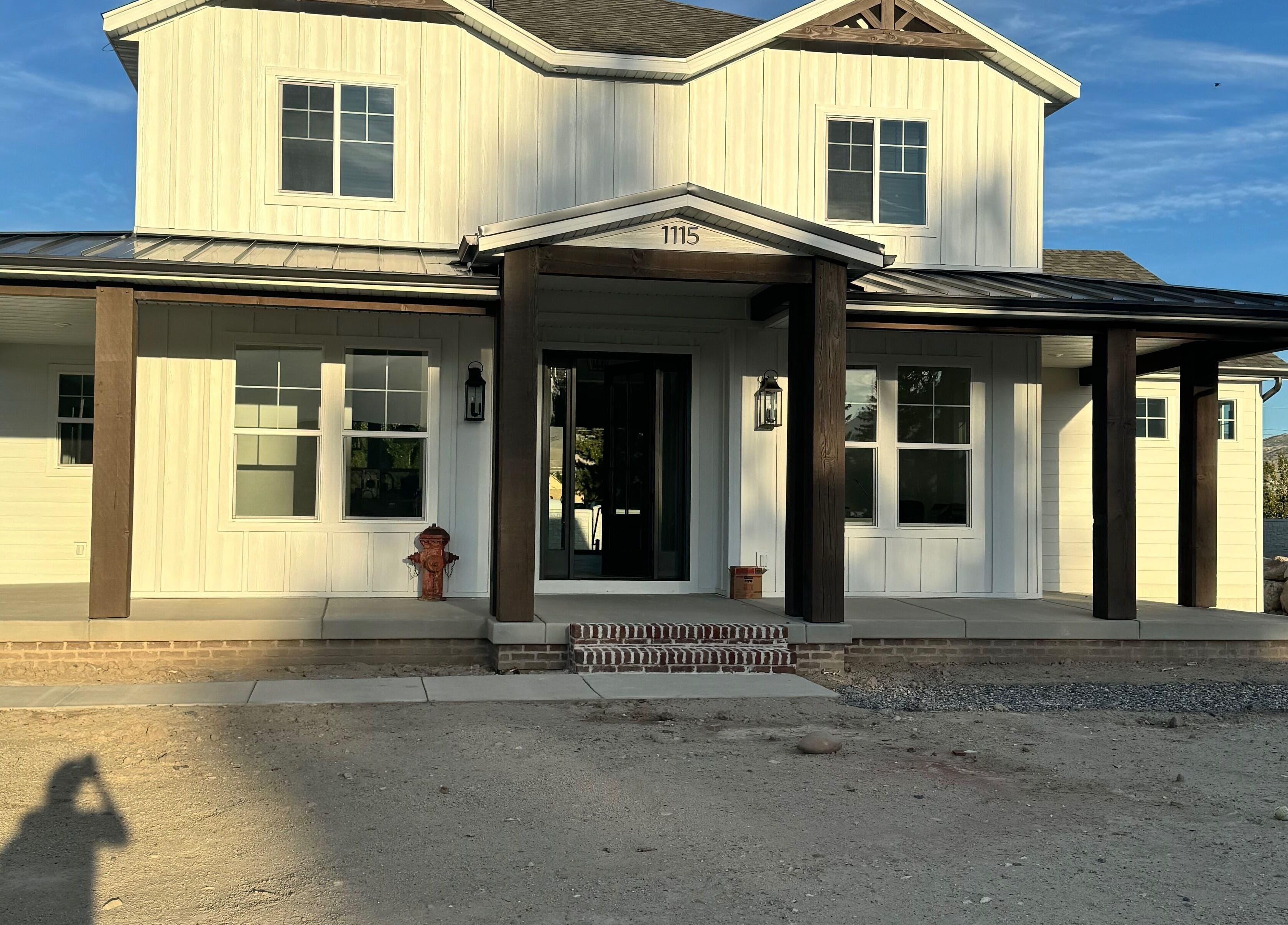 Exterior view of Nails By Janie in Lehi, Utah, US, showcasing a welcoming facade with a porch.