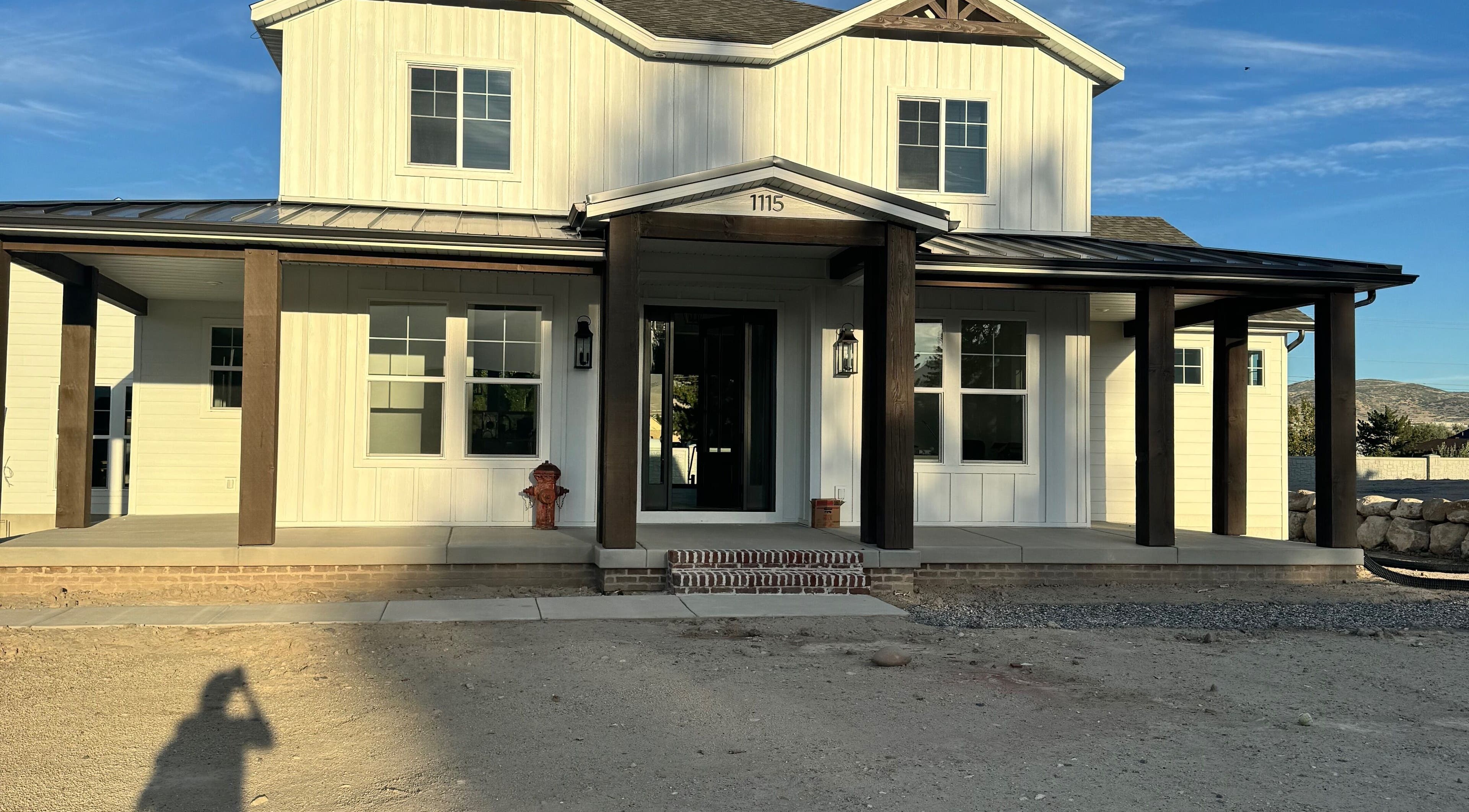 Exterior view of Nails By Janie in Lehi, Utah, US, showcasing a welcoming facade with a porch.