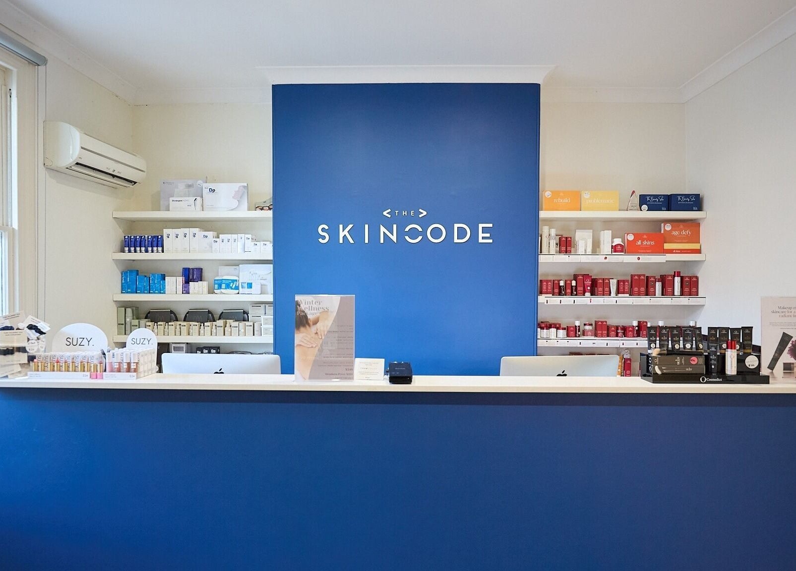 Reception at The Skin Code By Bronzalicious, North Sydney, New South Wales, AU, featuring skincare products.
