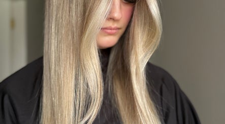 Sleek blonde hair styled at By Kodes Hair Artistry, Melbourne, Victoria, AU.