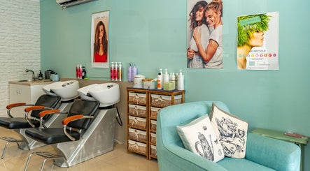 Modern salon chairs and decor at Hideaway Hair, Moffat Beach, Queensland, AU, showcasing a chic and inviting space.