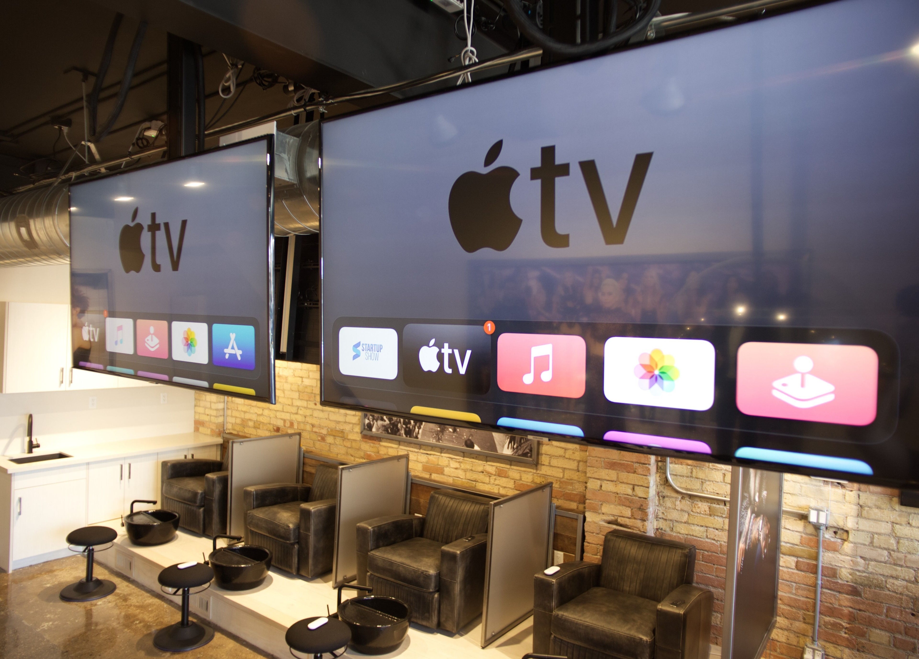 Luxury pedicure stations at Menicure Queen West in Toronto, Ontario, CA with modern aesthetics.