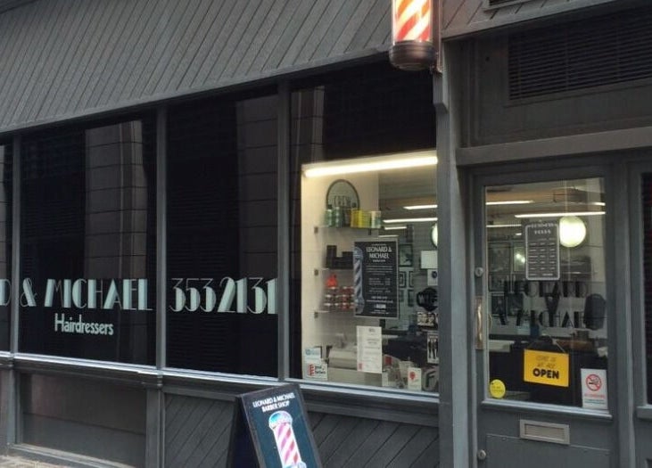 Front view of Leonard and Michael Barbershop in London, England, GB, showcasing a modern exterior.