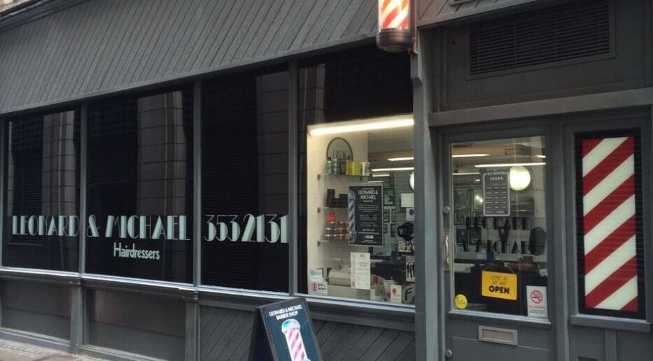Front view of Leonard and Michael Barbershop in London, England, GB, showcasing a modern exterior.