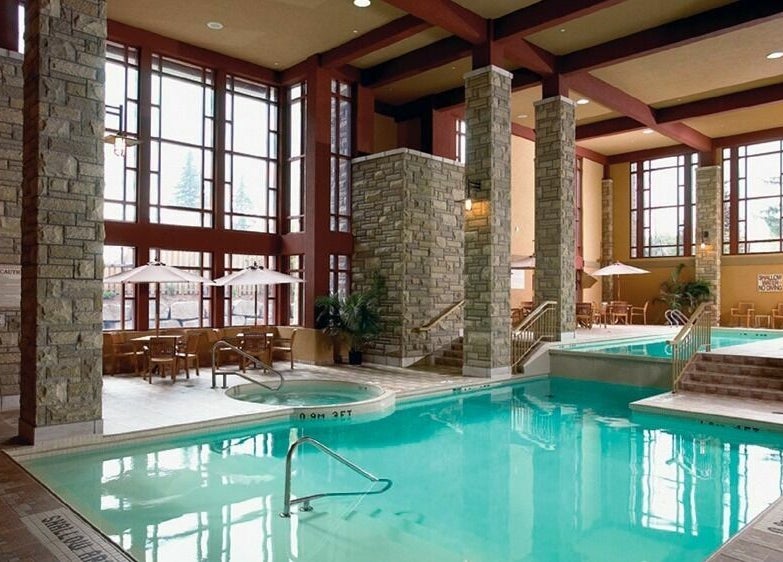 Relaxing indoor pool at Five Lakes Spa Aveda, Niagara Falls, Ontario, CA, offering a tranquil retreat.