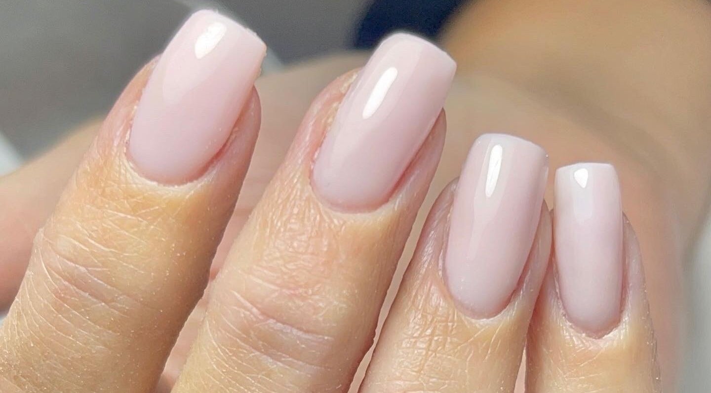 Elegant pink nails at Ninety Beauty, Guildford, England, GB showcasing exquisite polish and finish.