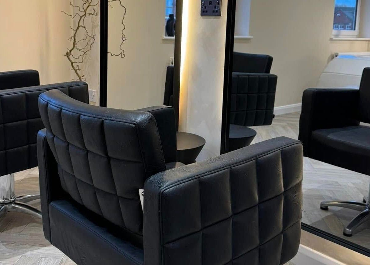 Luxurious salon chairs at The Booth, Shafton, England, GB, highlighting modern and elegant design.