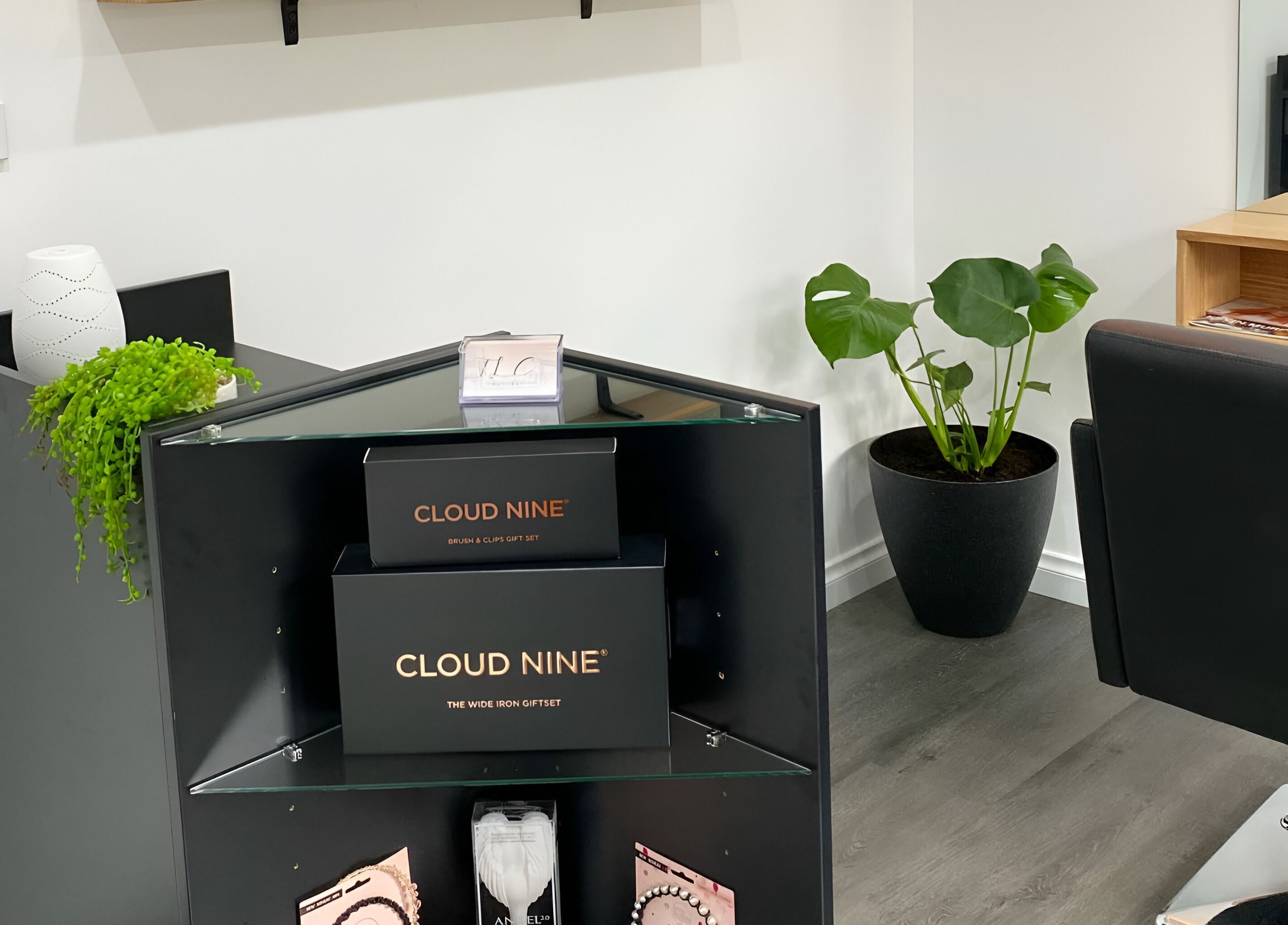 Modern reception at TLC Hair Bar in Melbourne, Victoria, AU with stylish decor and Cloud Nine products.