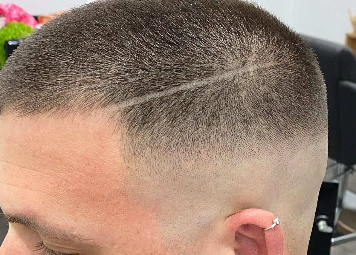 Close-up of a precision haircut at TLC Hair Bar in Melbourne, Victoria, AU, showcasing expert styling.