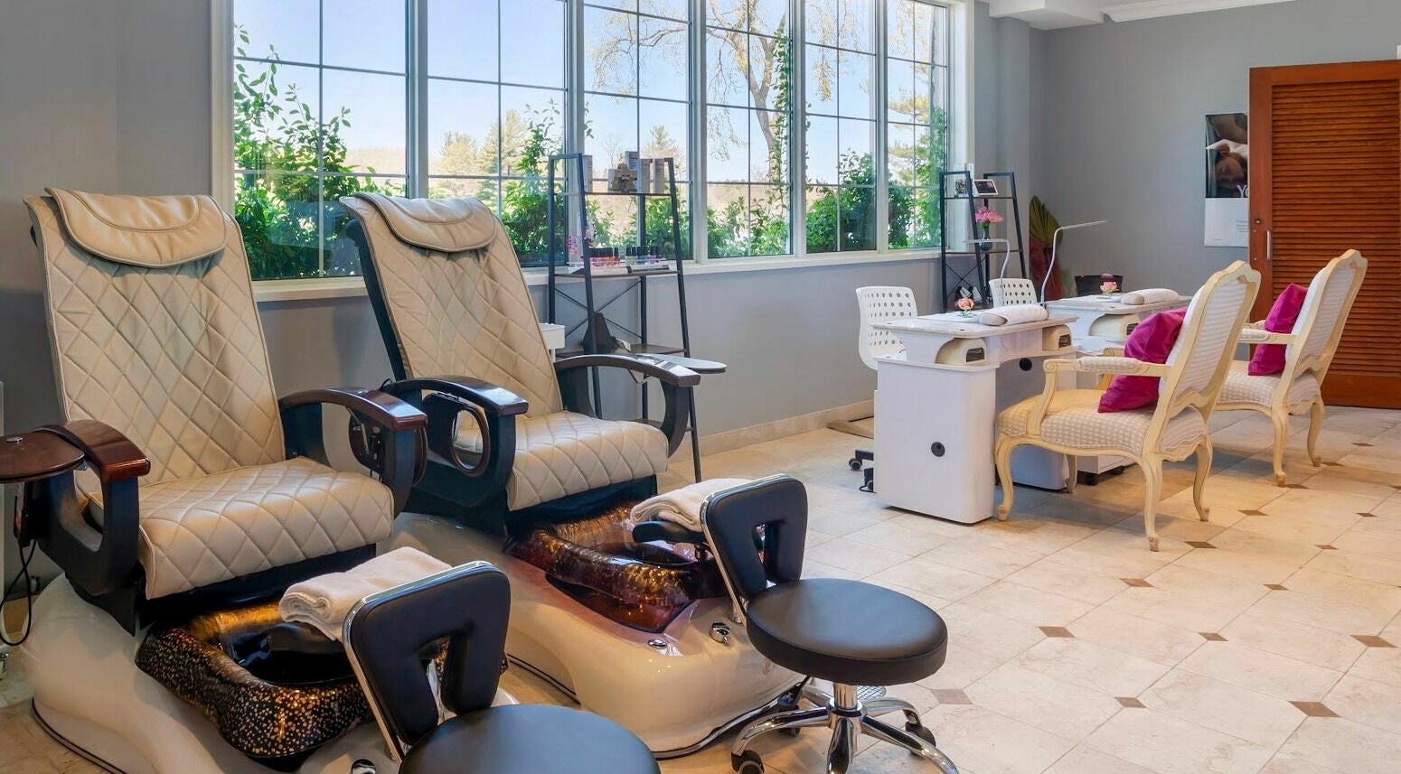 Luxurious spa chairs at Christie's Mill Inn and Spa, Port Severn, Ontario, CA bask in natural light.