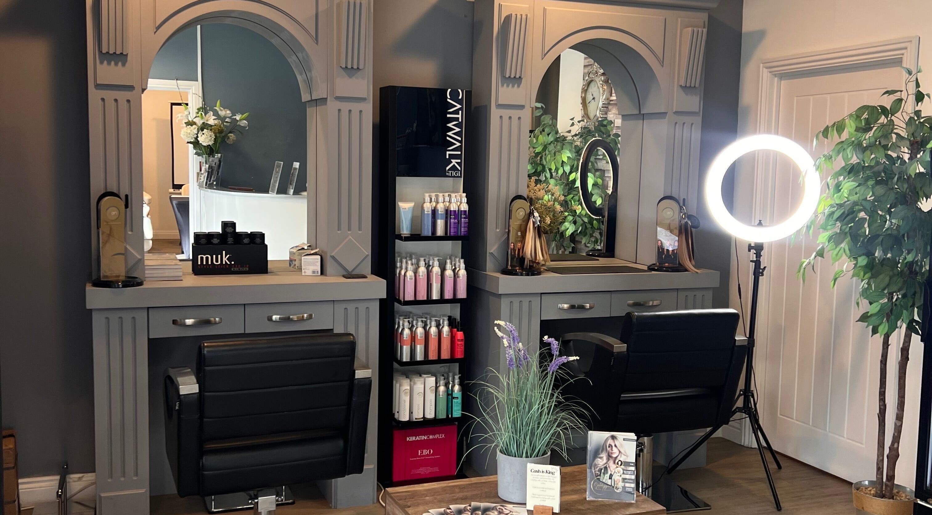 Elegant salon styling area at Goldiggers Hair & Beauty, Chippenham, England, GB featuring modern décor.