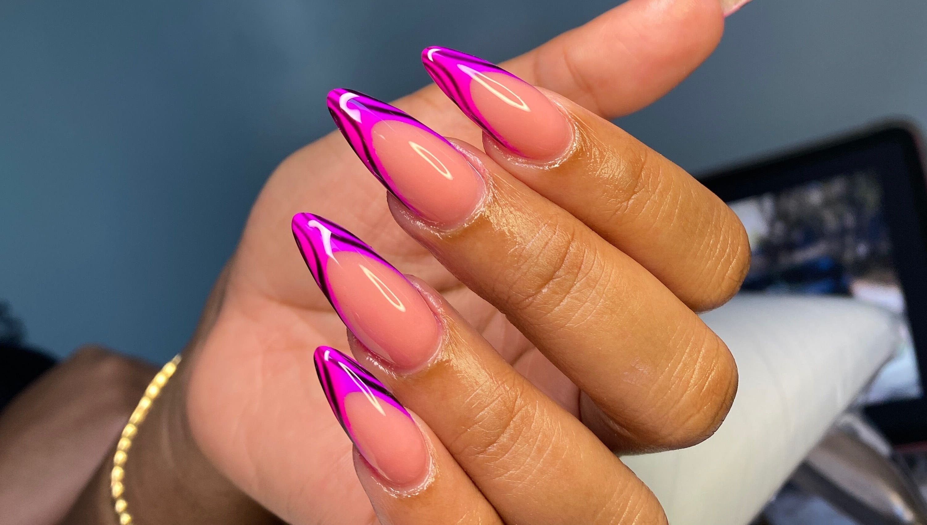 Vibrant pink nail art at Atinas’ Nail Studio, Oistins, Christ Church, BB showcasing elegant designs.