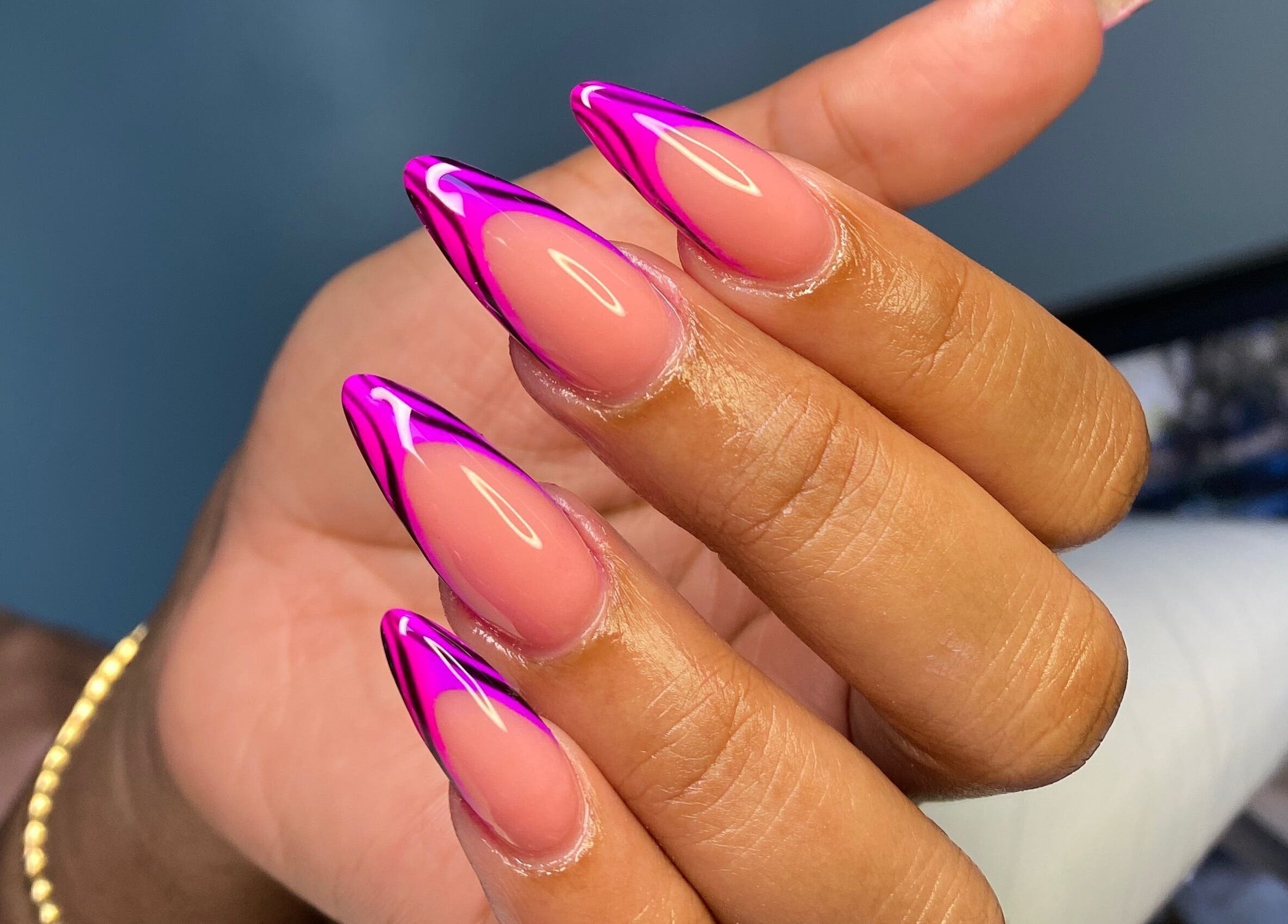 Vibrant pink nail art at Atinas’ Nail Studio, Oistins, Christ Church, BB showcasing elegant designs.