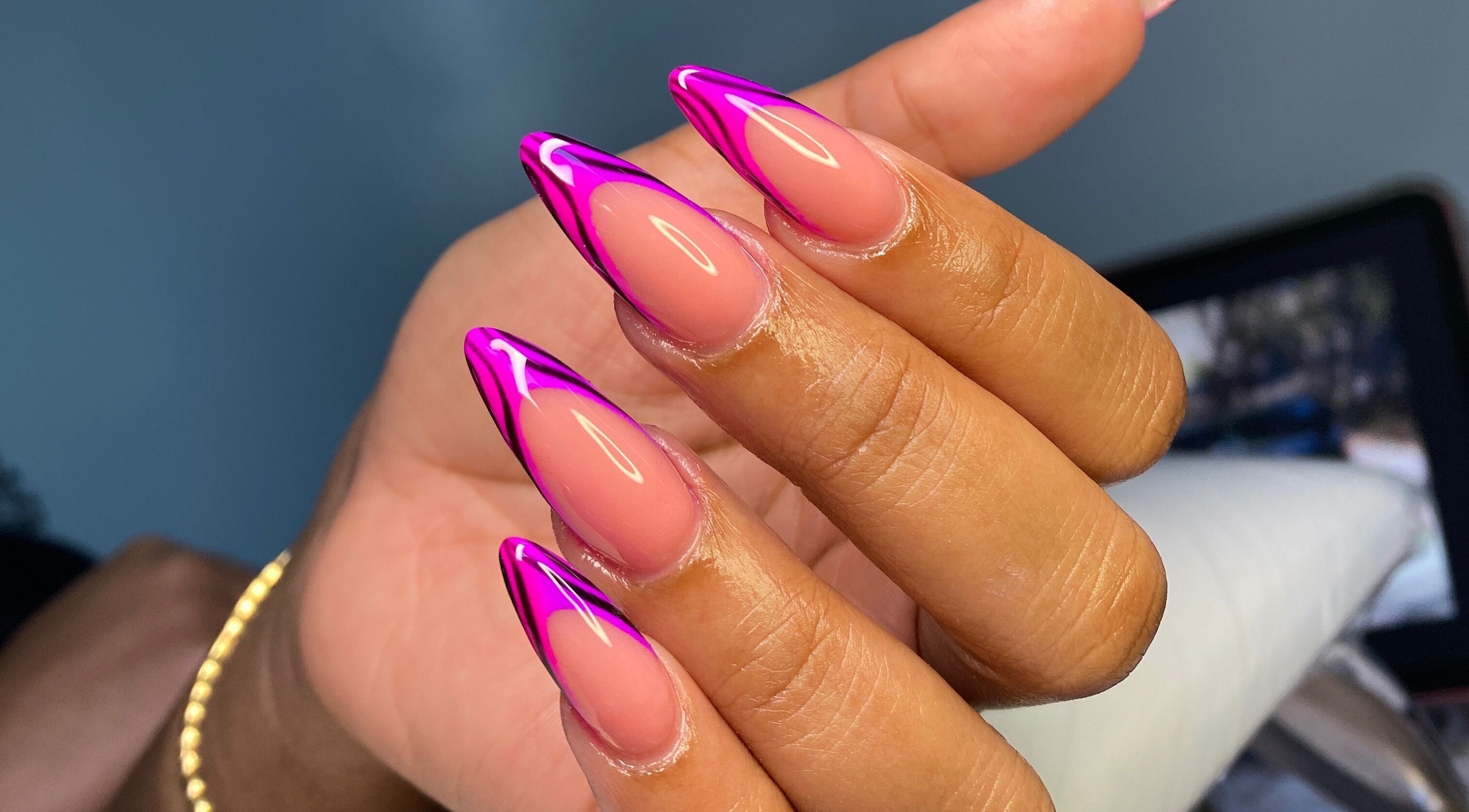 Vibrant pink nail art at Atinas’ Nail Studio, Oistins, Christ Church, BB showcasing elegant designs.