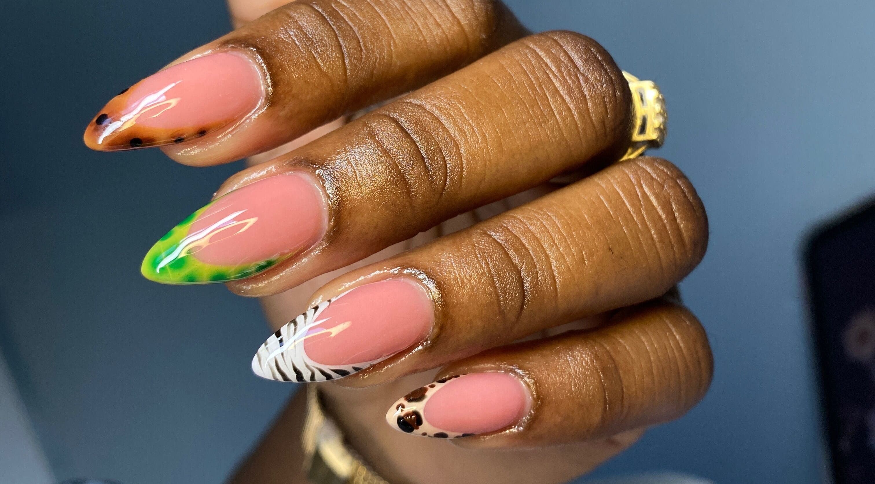 Vibrant nail art at Atinas’ Nail Studio, Oistins, Christ Church, BB. Beautiful and unique designs displayed.