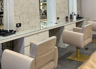 Modern salon chairs at SLJ HAIR & HAIR EXTENSION SPECIALIST, Stockton-on-Tees, England, GB.