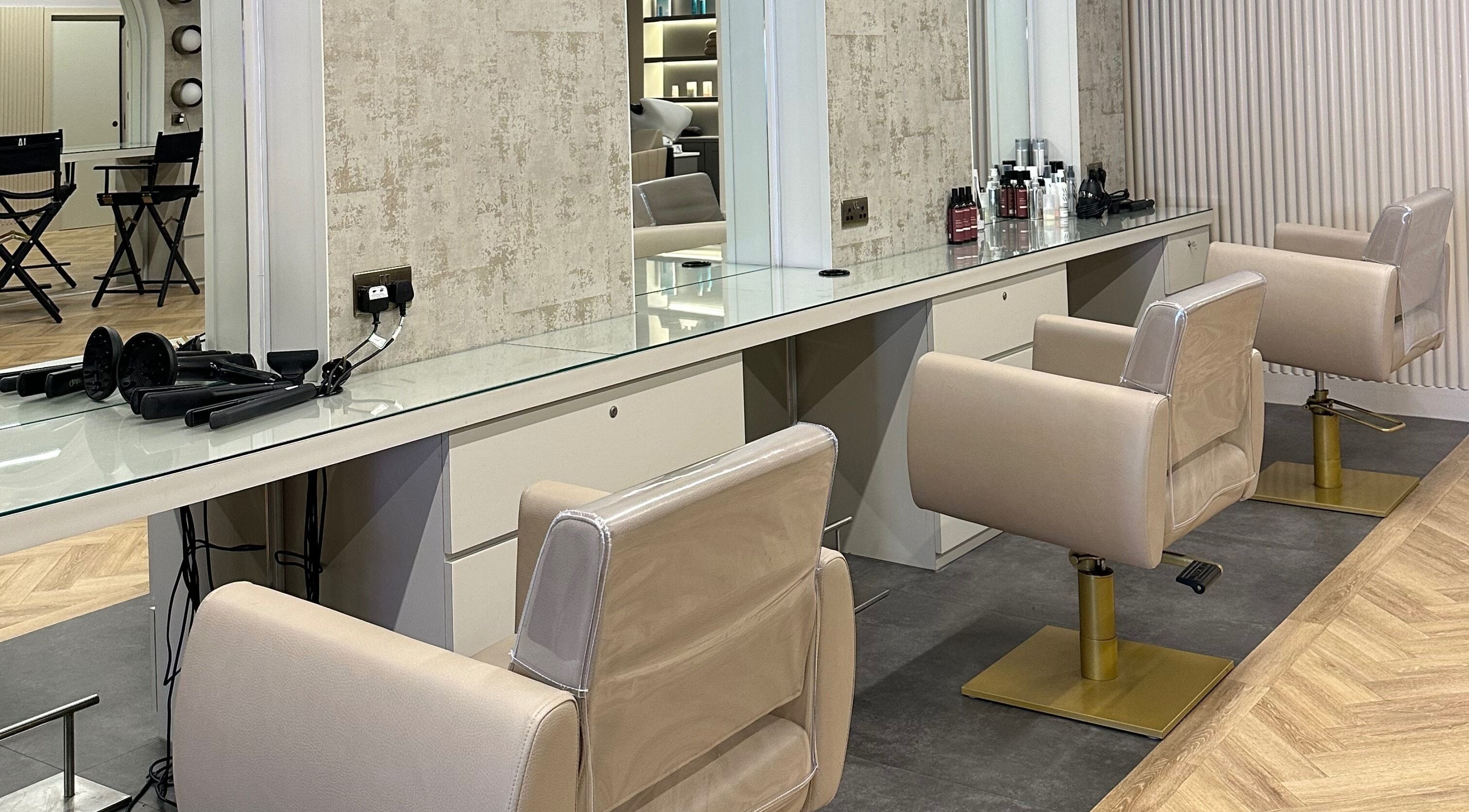 Modern salon chairs at SLJ HAIR & HAIR EXTENSION SPECIALIST, Stockton-on-Tees, England, GB.