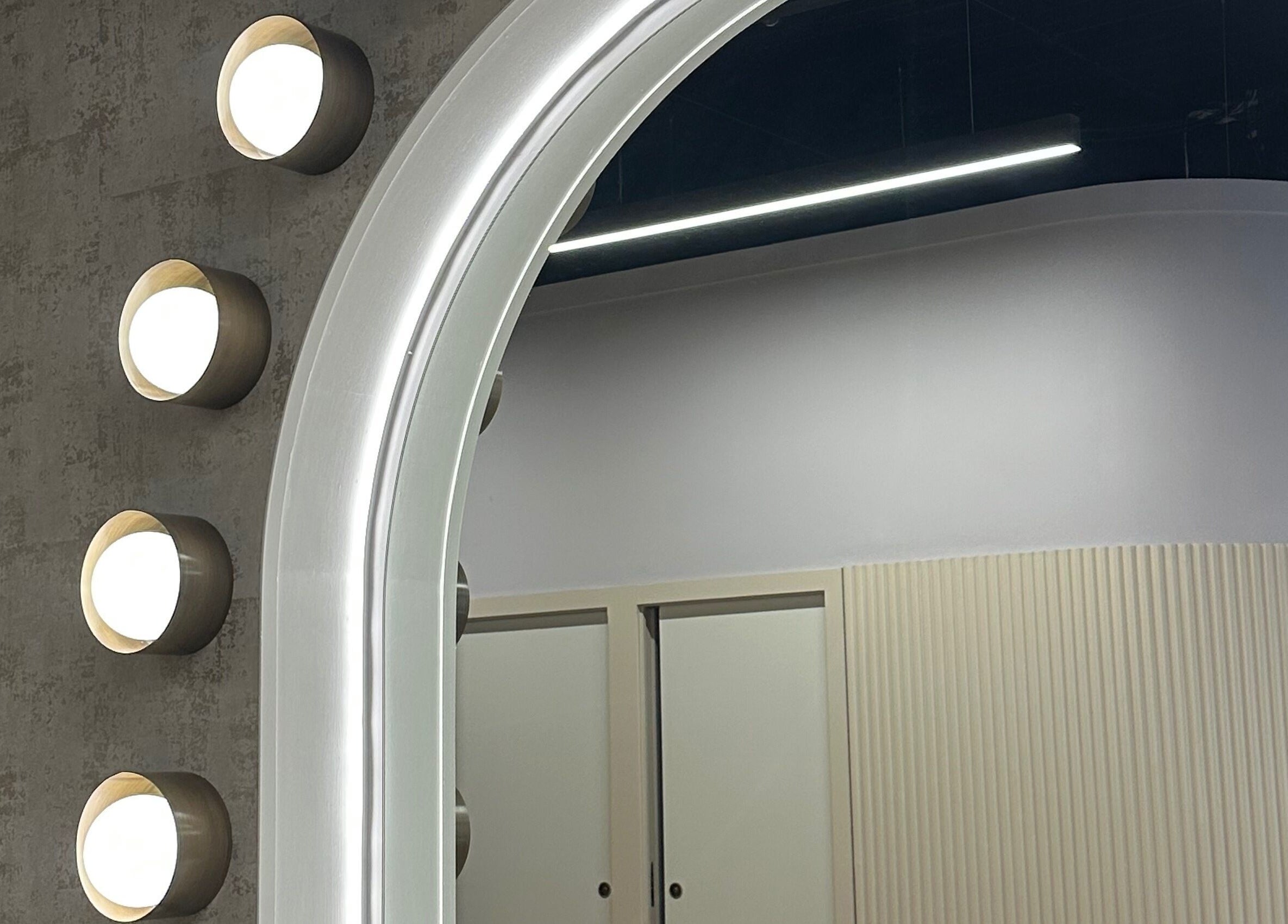 Modern salon mirror lighting at SLJ HAIR & HAIR EXTENSION SPECIALIST, Stockton-on-Tees, England, GB.