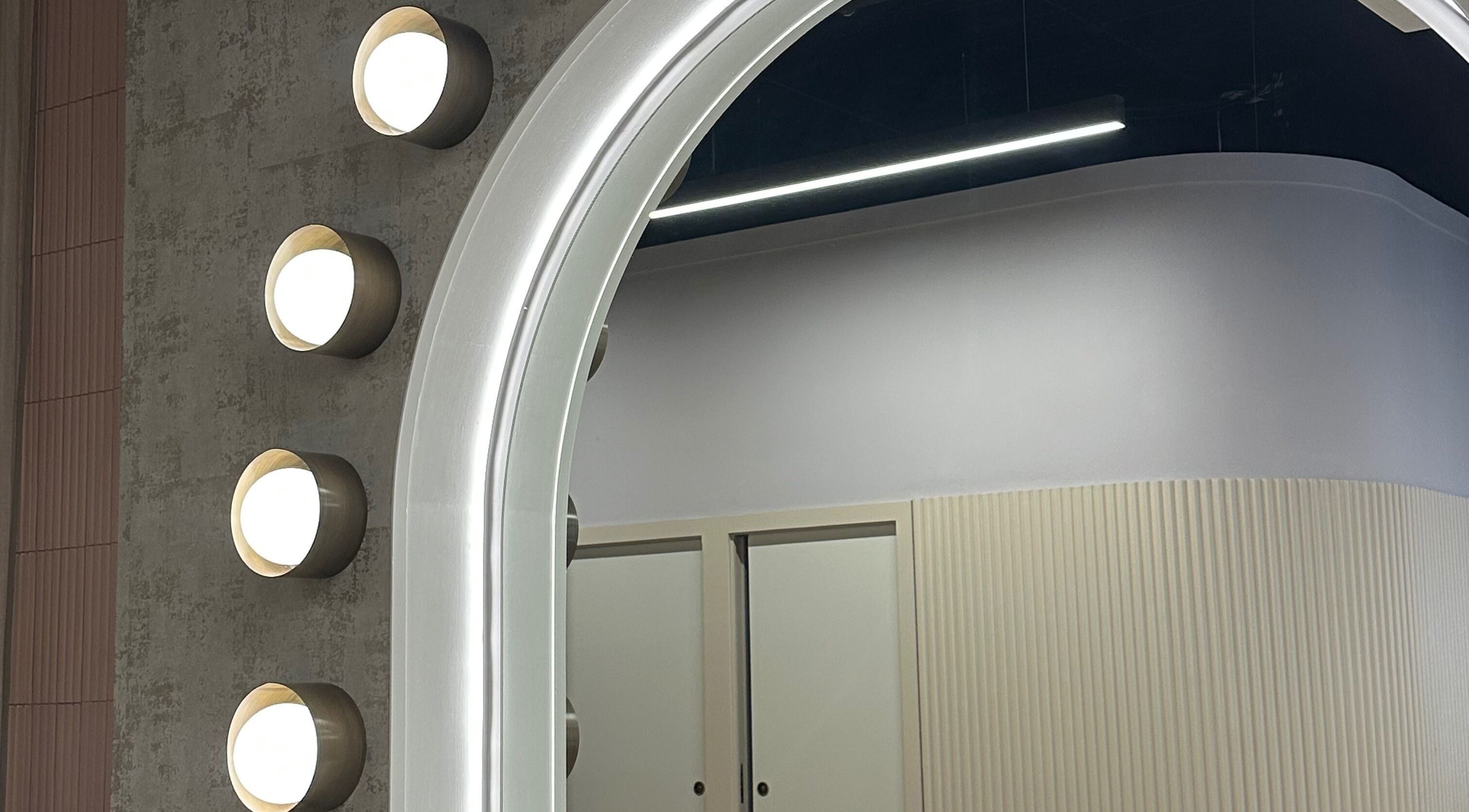 Modern salon mirror lighting at SLJ HAIR & HAIR EXTENSION SPECIALIST, Stockton-on-Tees, England, GB.