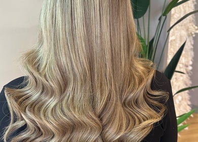 Blonde hair in soft waves at SLJ HAIR & HAIR EXTENSION SPECIALIST, Stockton-on-Tees, England, GB.